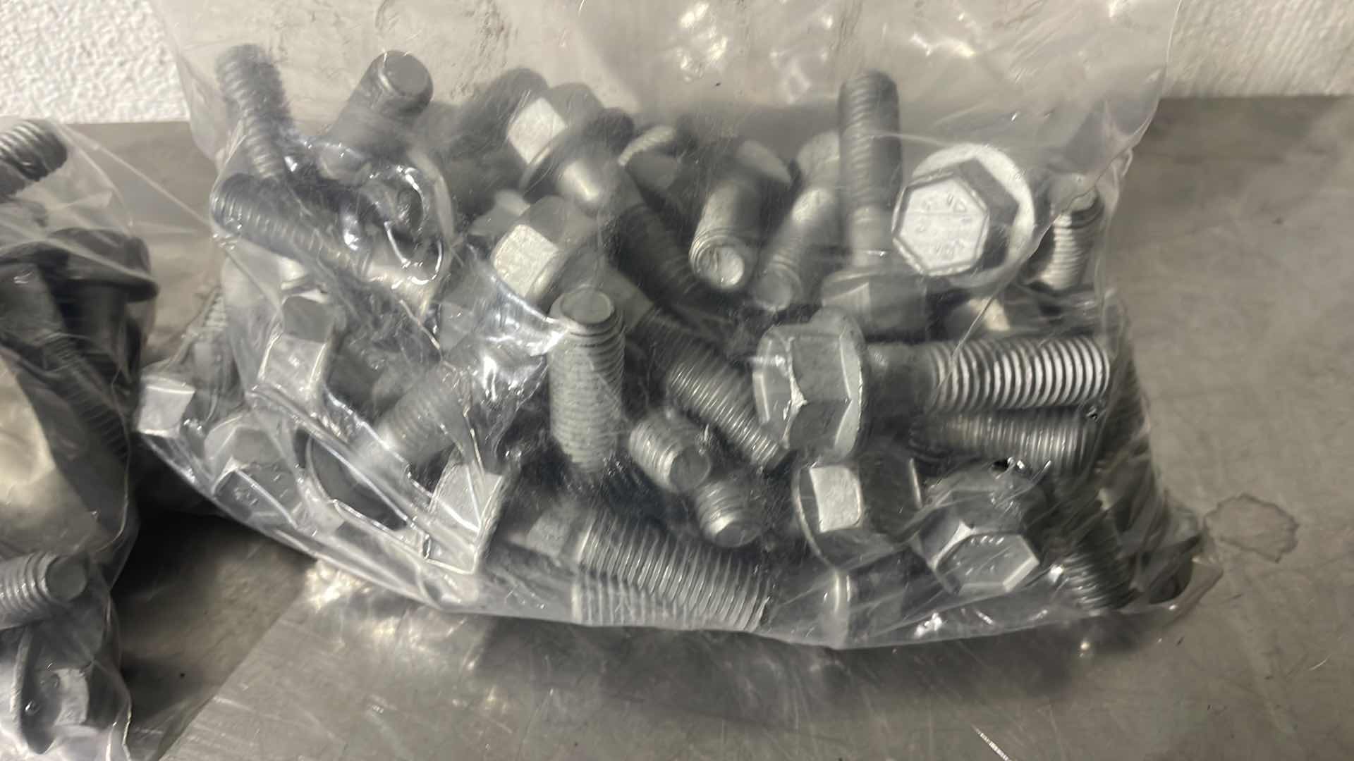 Photo 1 of 1/2”-13 X 2” FLANGE BOLT GRADE 8 (100)