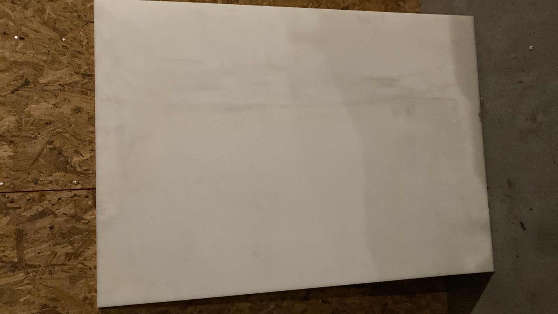 Photo 1 of HD POLYETHYLENE WHITE CUTTING BOARD 34” X 48.5” H 0.75”