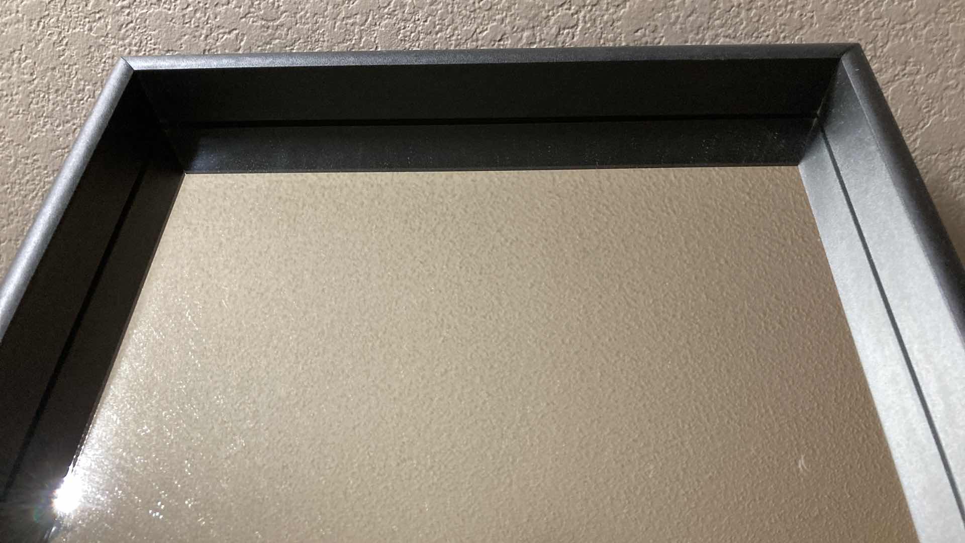 Photo 1 of BLACK FRAMED MIRROR 16” X 33.5”