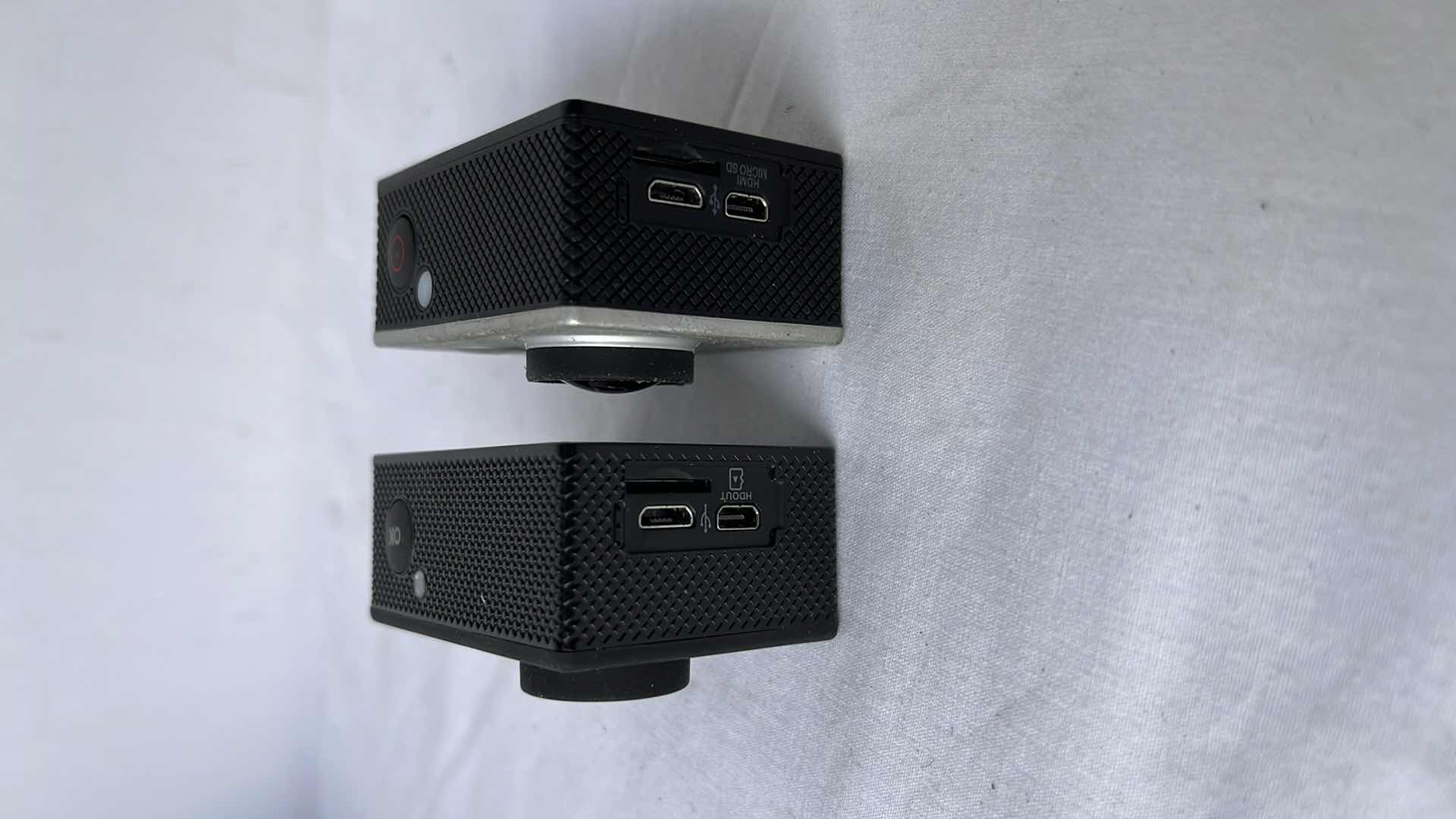 Photo 1 of DYMCO 4K ULTRA HD ACTION CAMERA (MODEL AC-F60R) & v4.0 4K ULTRA HD ACTION CAMERA INCLUDES CASE WITH ACCESSORIES