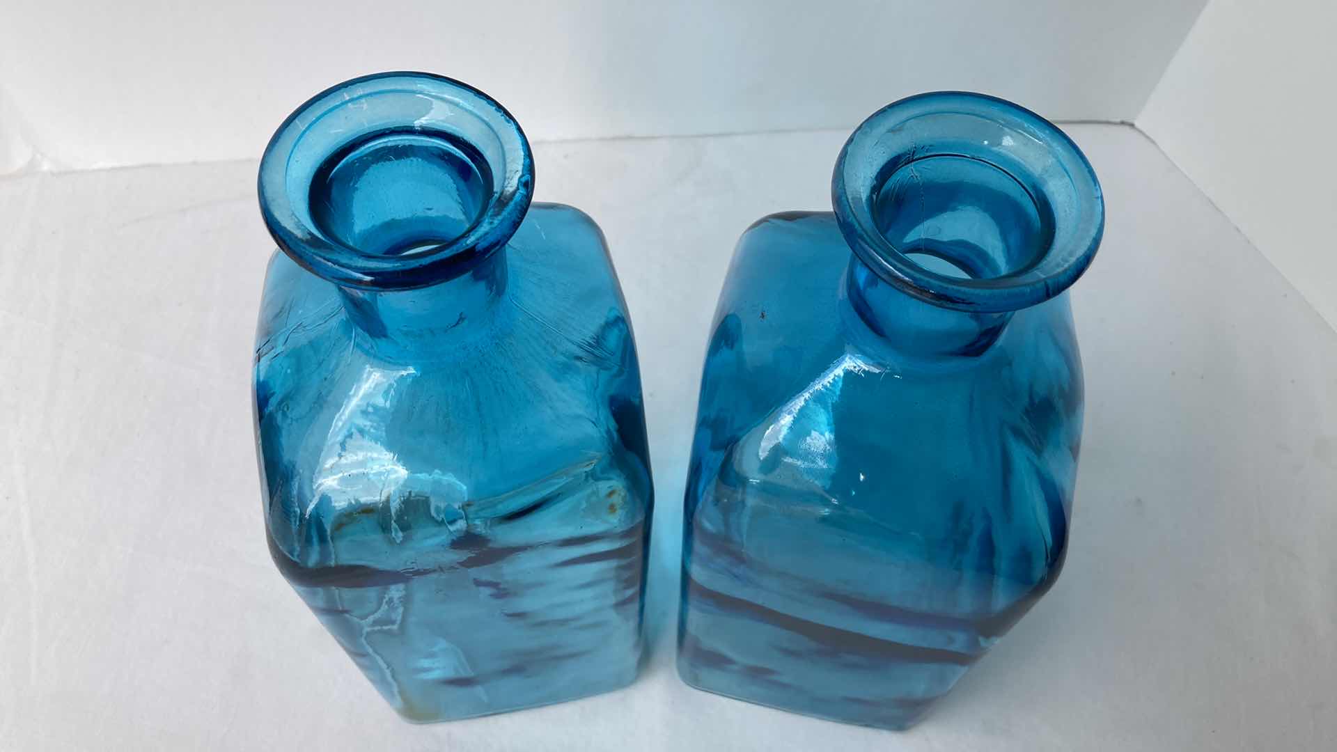 Photo 1 of TEAL CLEAR GLASS JUGS (2) 4” X 4” H11.25”