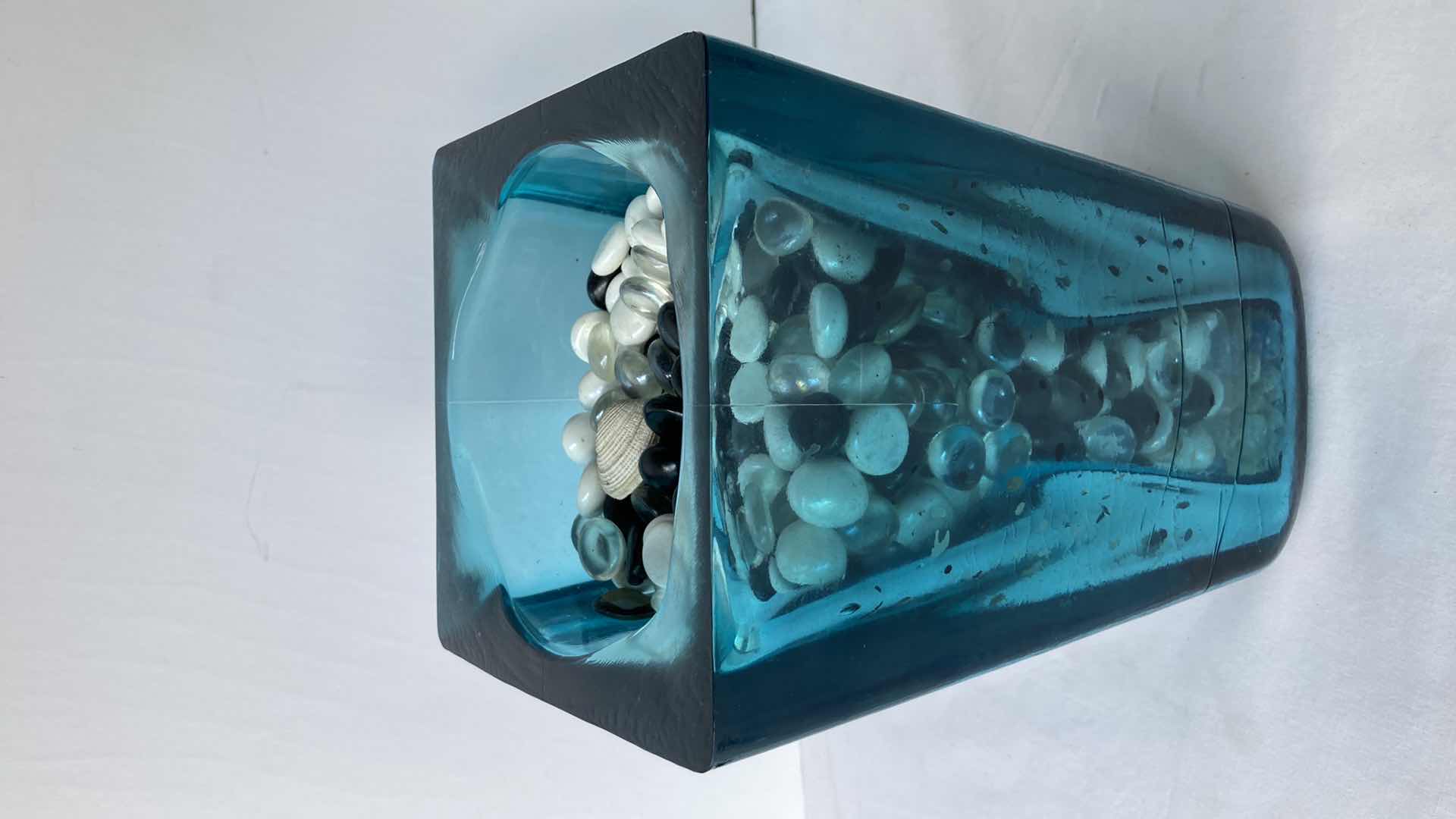 Photo 1 of TEAL CLEAR GLASS VASE W MARBLES 6.5” X 6.5” H11”