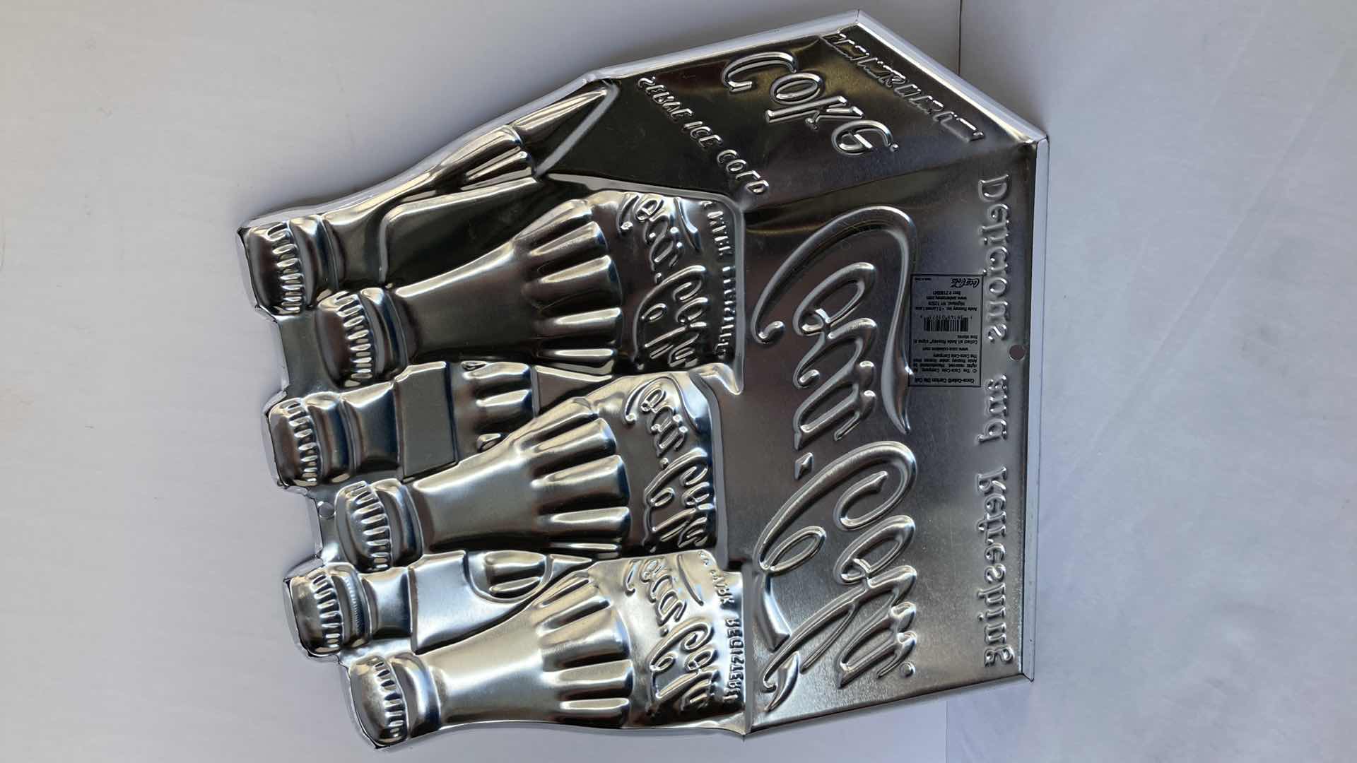 Photo 1 of COCA-COLA CARTON DIE CUT TIN SIGN 12” X 13”