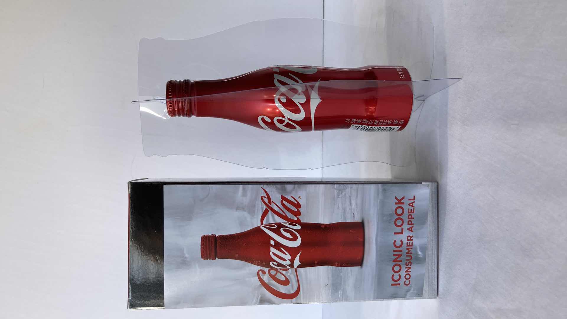 Photo 1 of NEW COCA-COLA RED ALUMINUM 8.5OZ FULL BOTTLE & COCA-COLA CHRISTMAS 1996 8OZ FULL BOTTLE