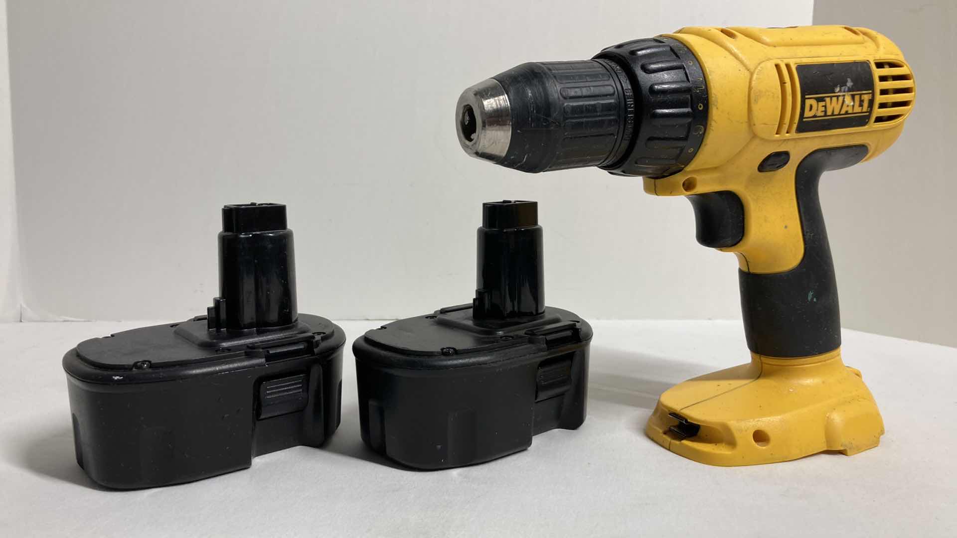 Photo 1 of DEWALT CORDLESS DRILL W 2 RECHARGEABLE BATTERIES & CASE