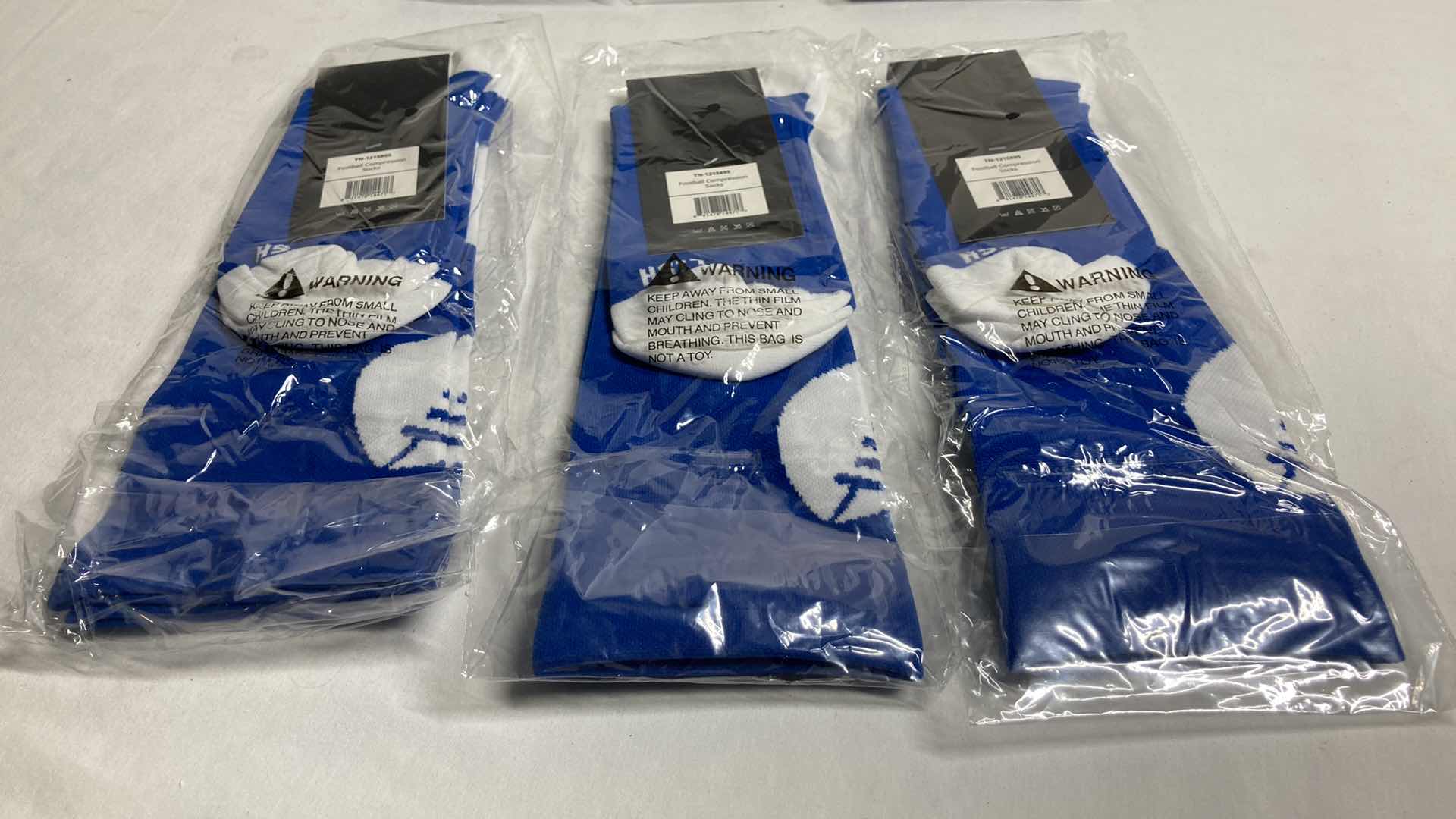 Photo 1 of NEW LISH BLUE/WHITE FOOTBALL COMPRESSION SOCKS SIZE M/L (3)