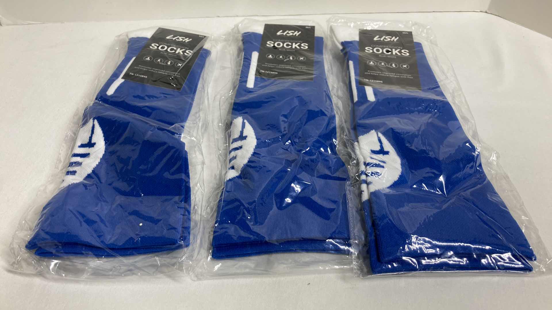 Photo 1 of NEW LISH BLUE/WHITE FOOTBALL COMPRESSION SOCKS SIZE M/L (3)