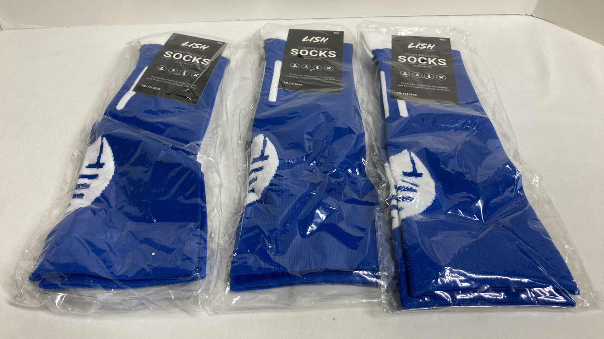 Photo 1 of NEW LISH BLUE/WHITE FOOTBALL COMPRESSION SOCKS SIZE M/L (3)