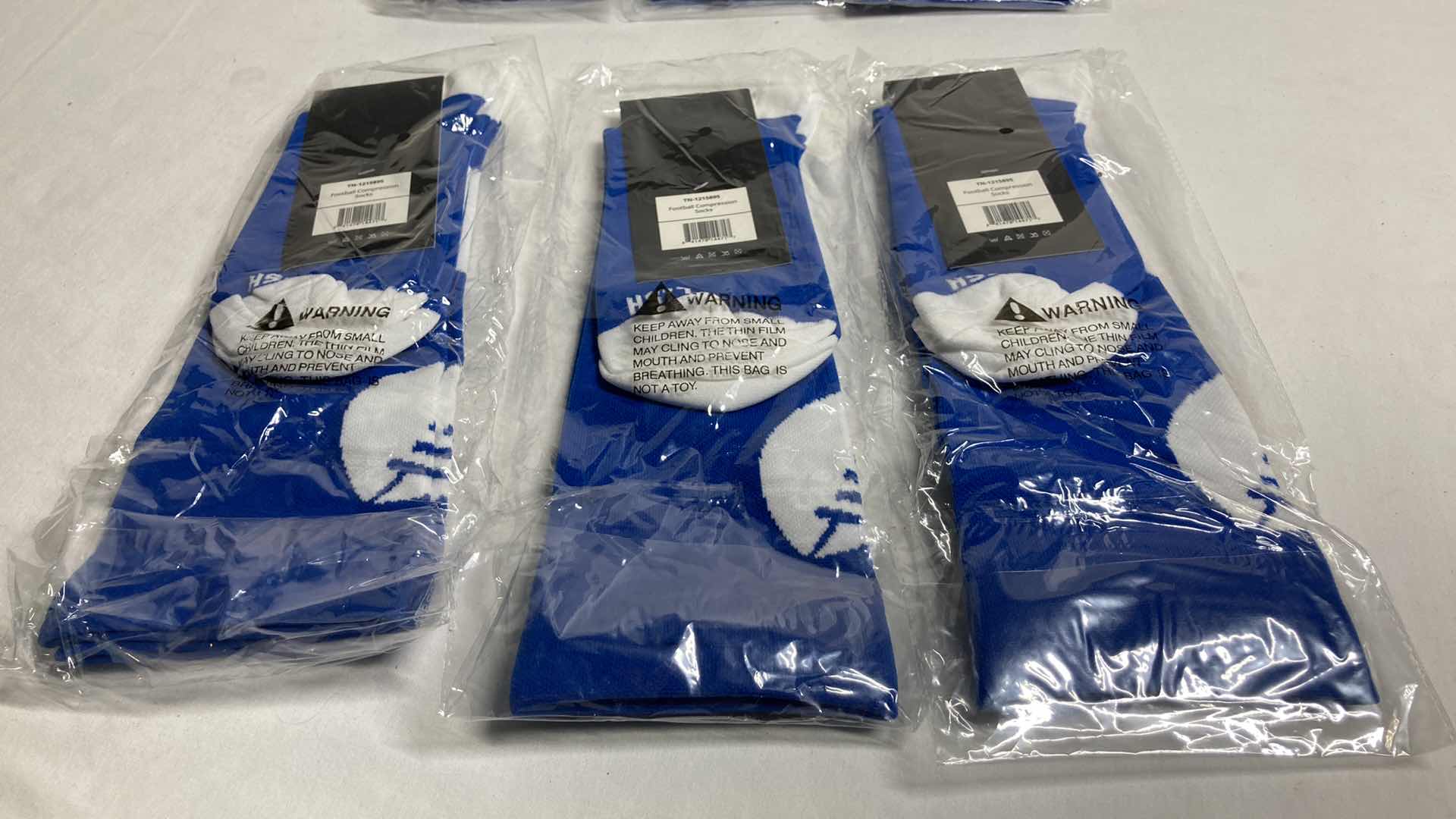 Photo 1 of NEW LISH BLUE/WHITE FOOTBALL COMPRESSION SOCKS SIZE M/L (3)