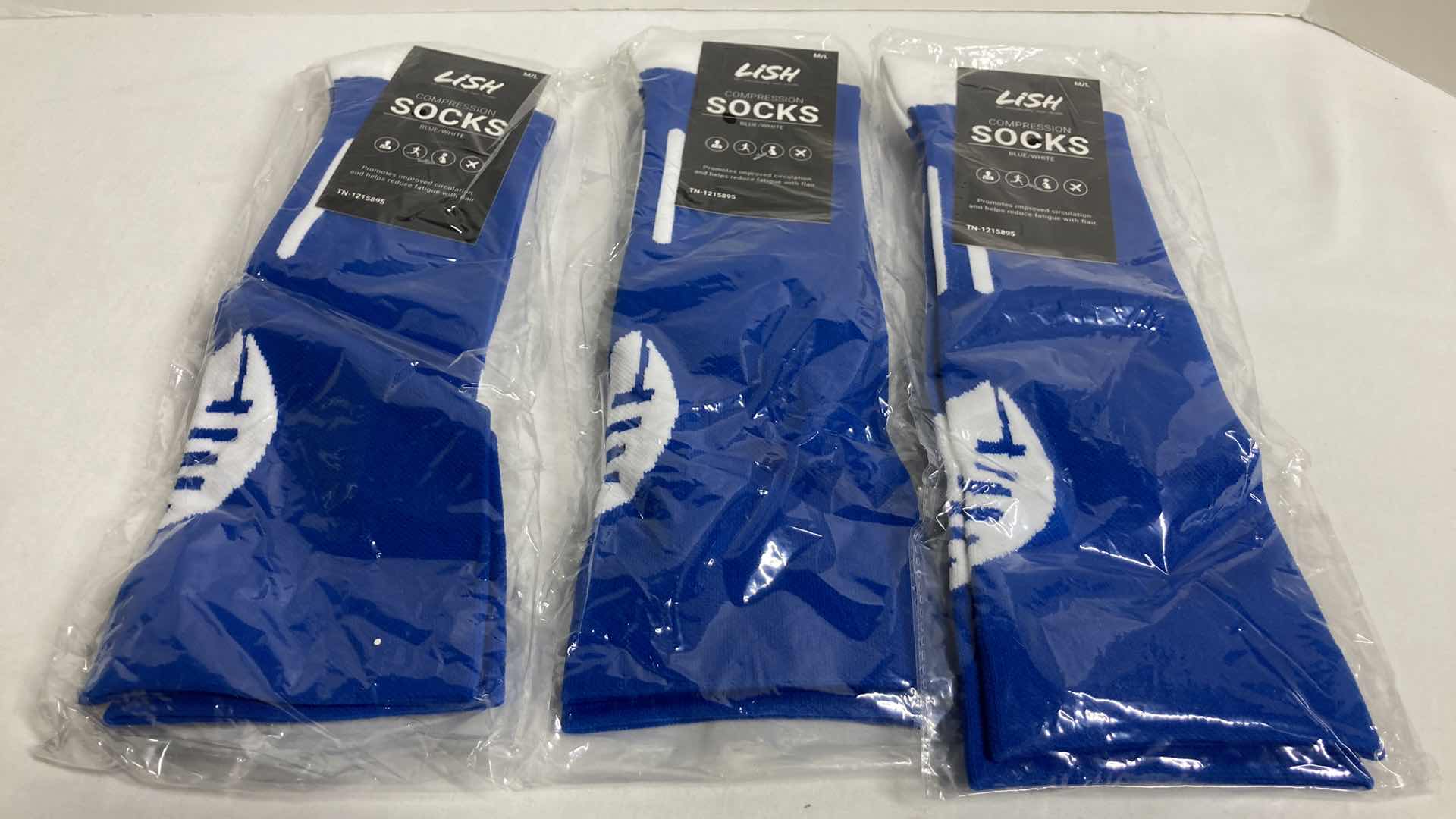 Photo 1 of NEW LISH BLUE/WHITE FOOTBALL COMPRESSION SOCKS SIZE M/L (3)
