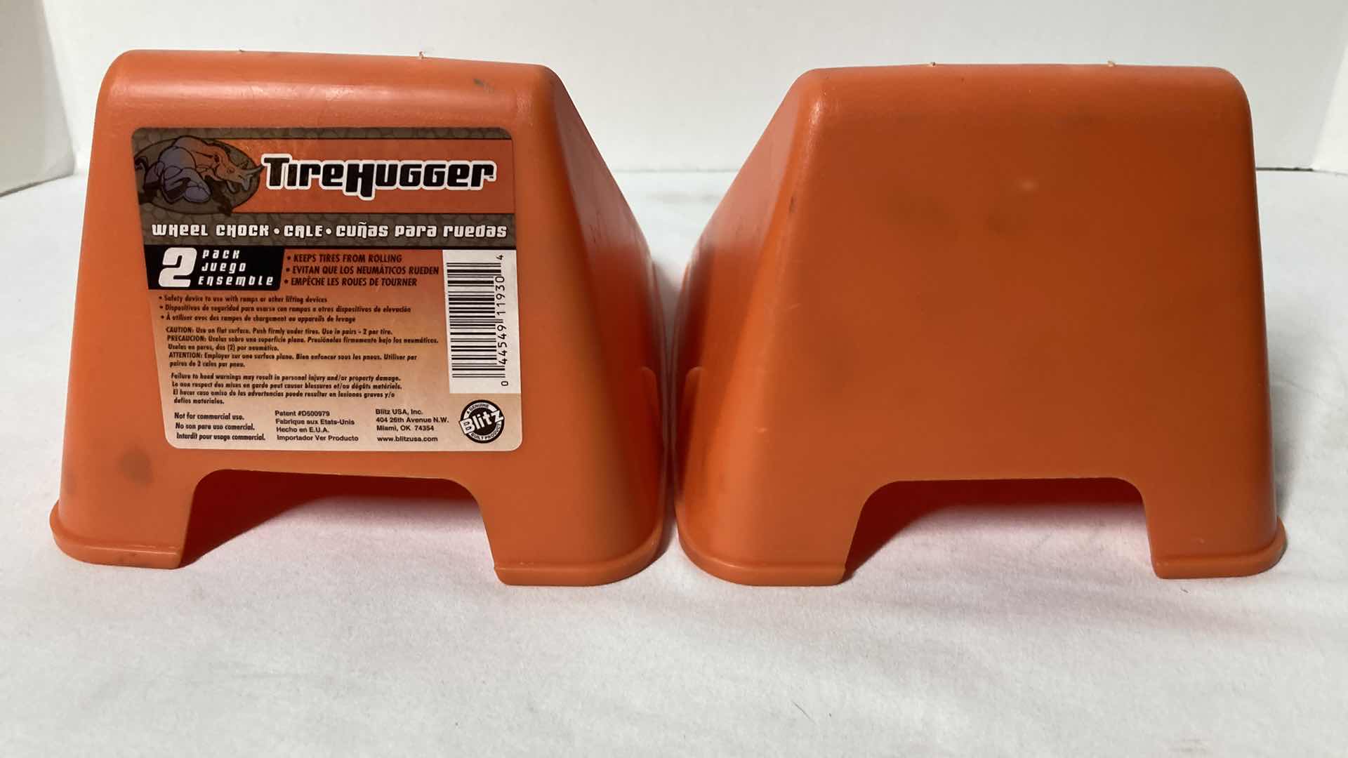 Photo 1 of TIRE HUGGER PLASTIC WHEEL CHALKS (2) & JUMPER CABLES