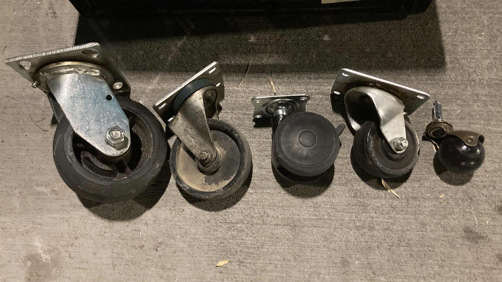 Photo 1 of MULTI PURPOSE CASTERS W MILK CRATE