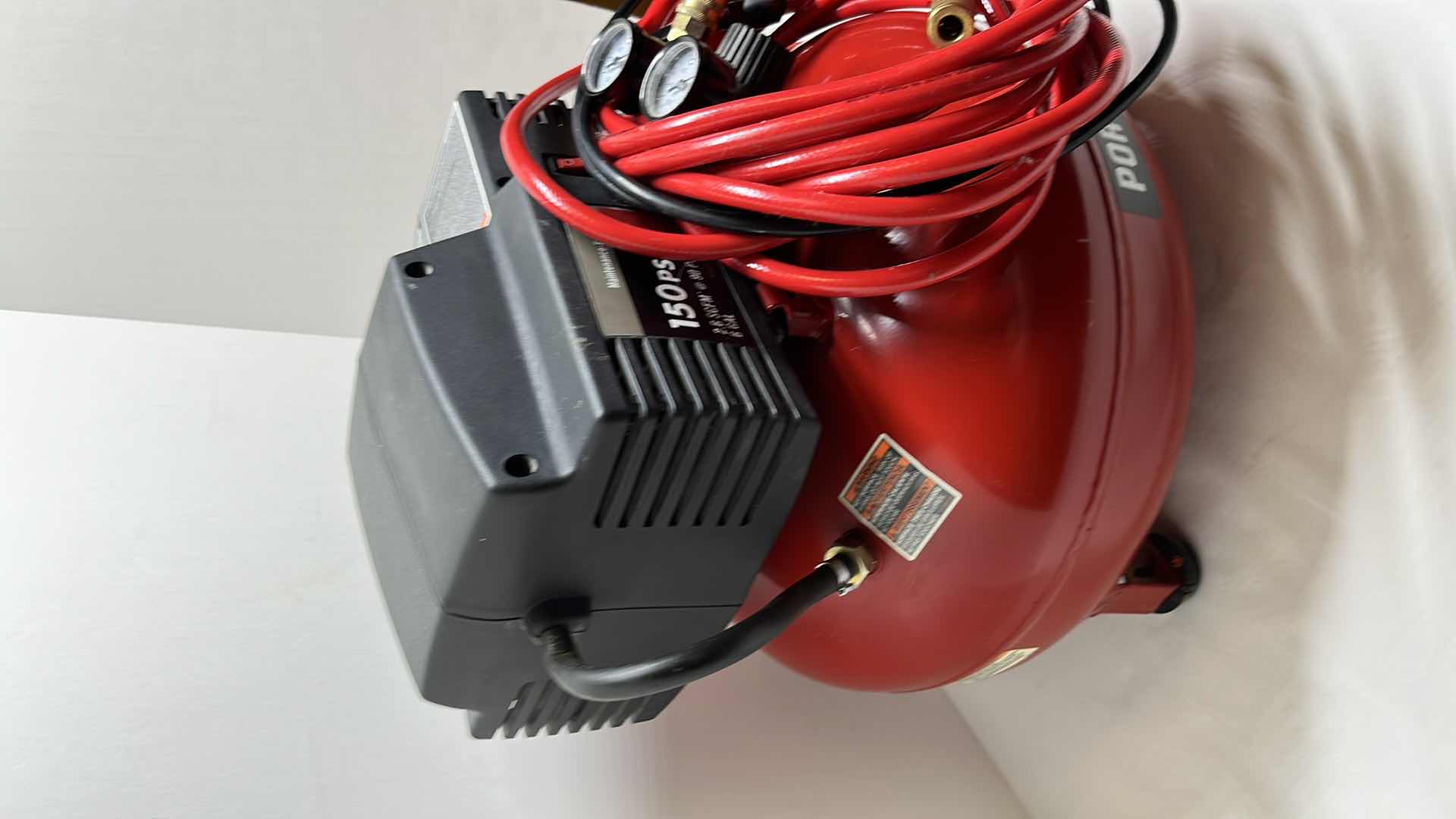 Photo 2 of PORTER CABLE 6 GAL 150 PSI PORTABLE ELECTRIC PANCAKE AIR COMPRESSOR MODEL C2006