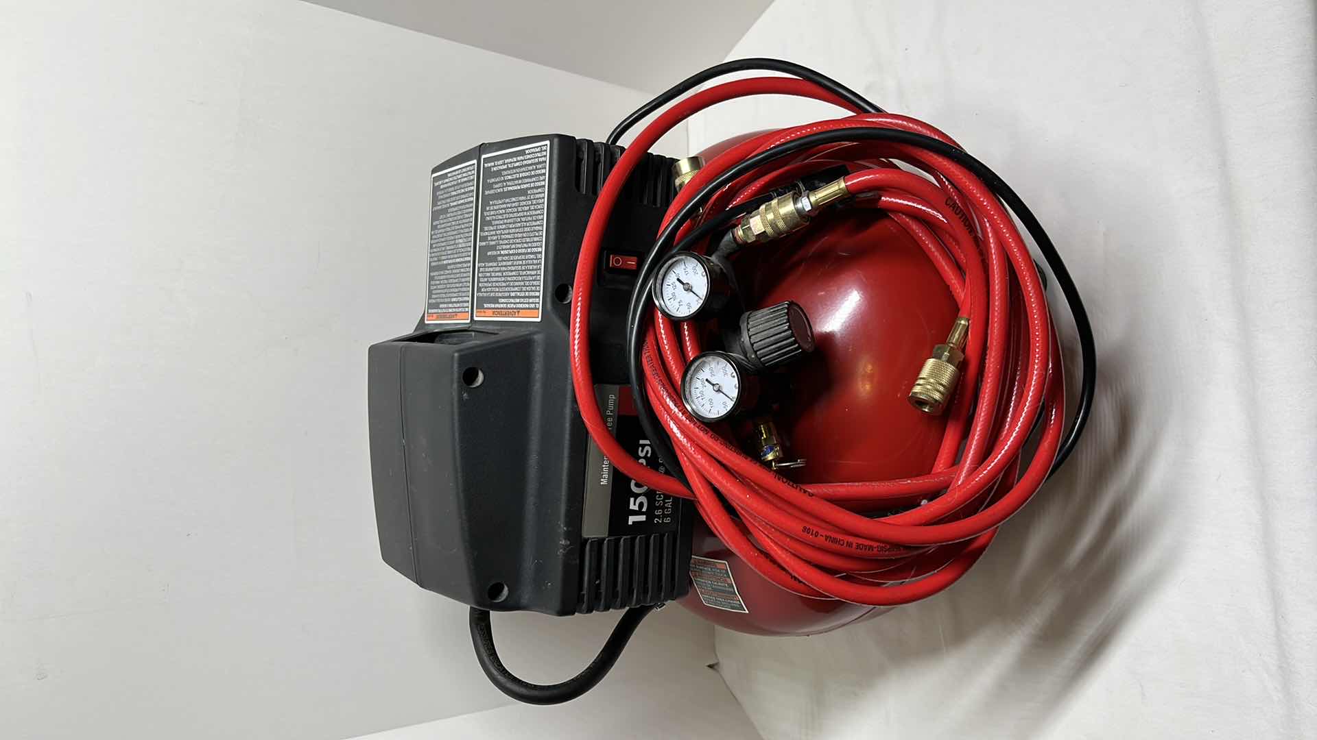 Photo 1 of PORTER CABLE 6 GAL 150 PSI PORTABLE ELECTRIC PANCAKE AIR COMPRESSOR MODEL C2006