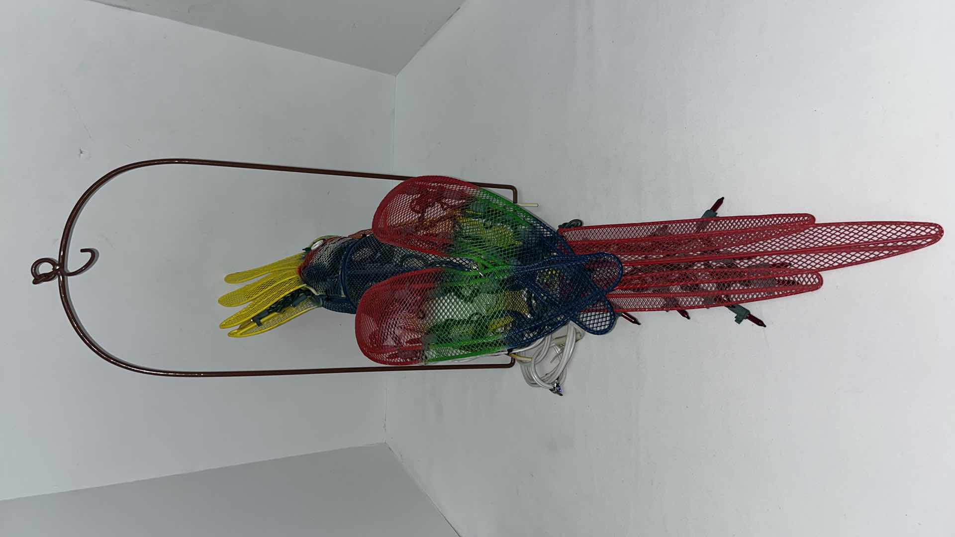Photo 1 of AUTOMATED LIGHT-UP METAL HANGING PARROT