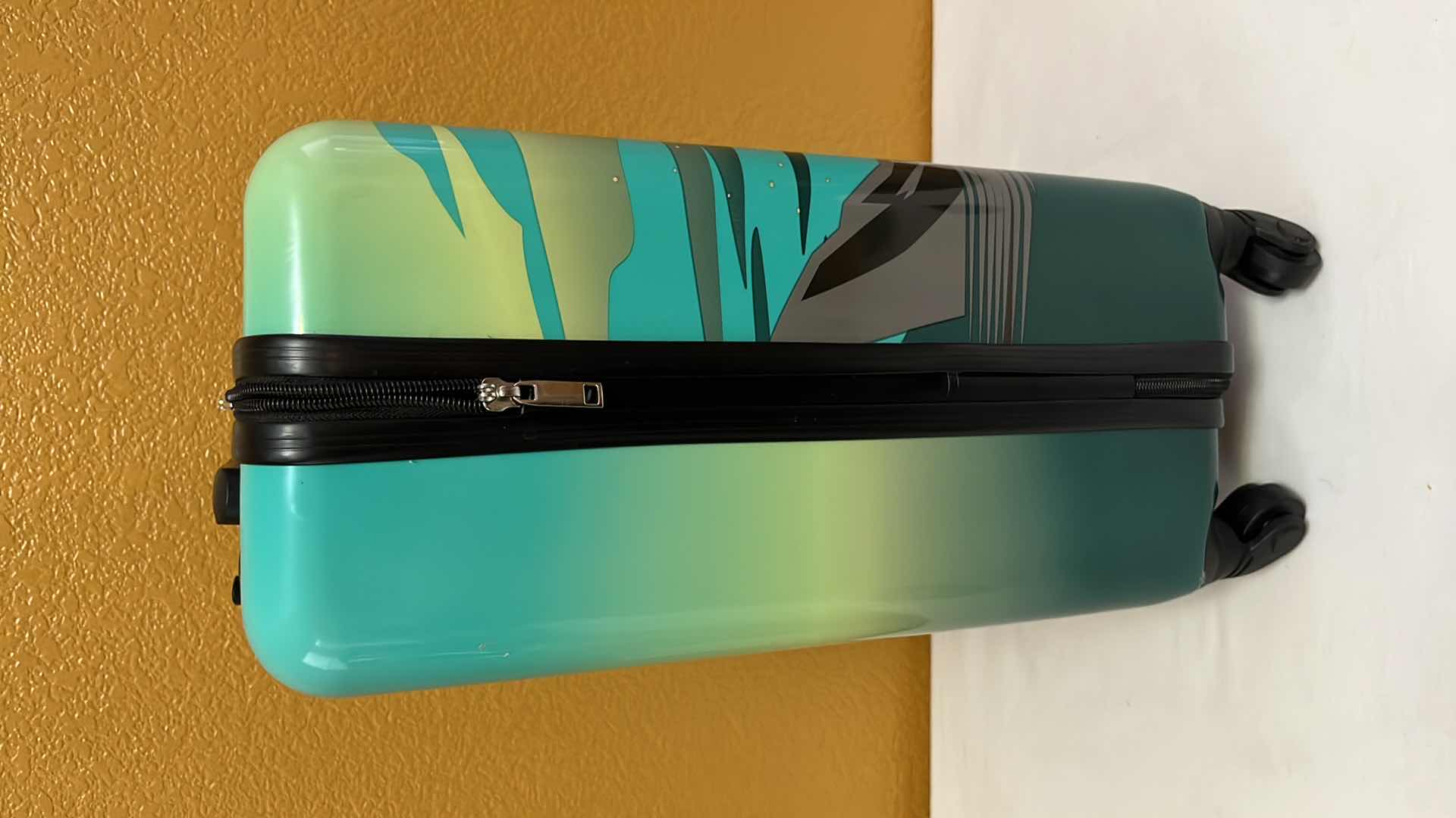 Photo 2 of DISNEY STAR WARS THE MANDALORIAN GROGU 21” HARDSIDE SPINNER SUITCASE