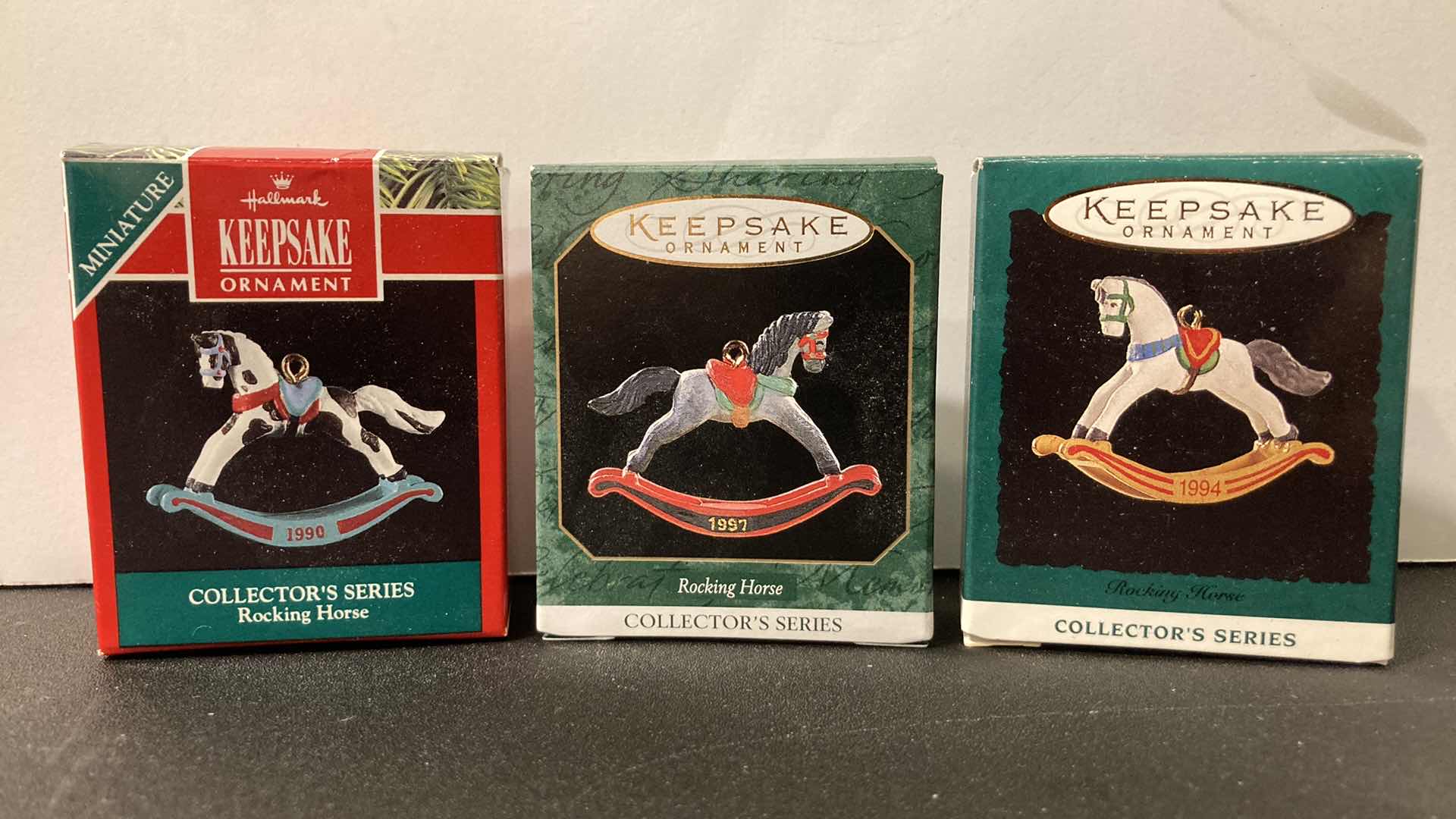 Photo 1 of NEW HALLMARK KEEPSAKE ROCKING HORSE COLLECTORS SERIES ORNAMENTS (3)