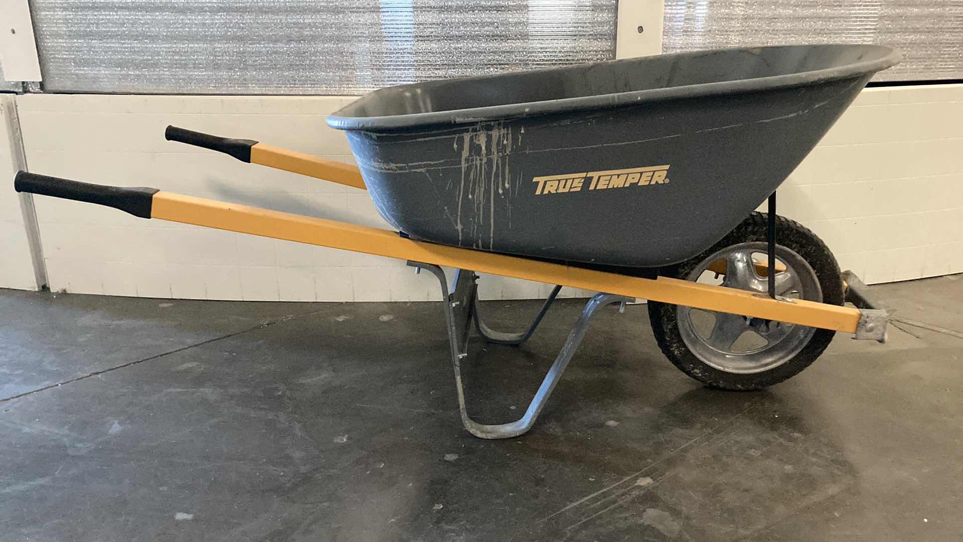 Photo 1 of TRUE TEMPER TIRE NEVER FLAT WHEEL BARREL 62” X 25” H27”