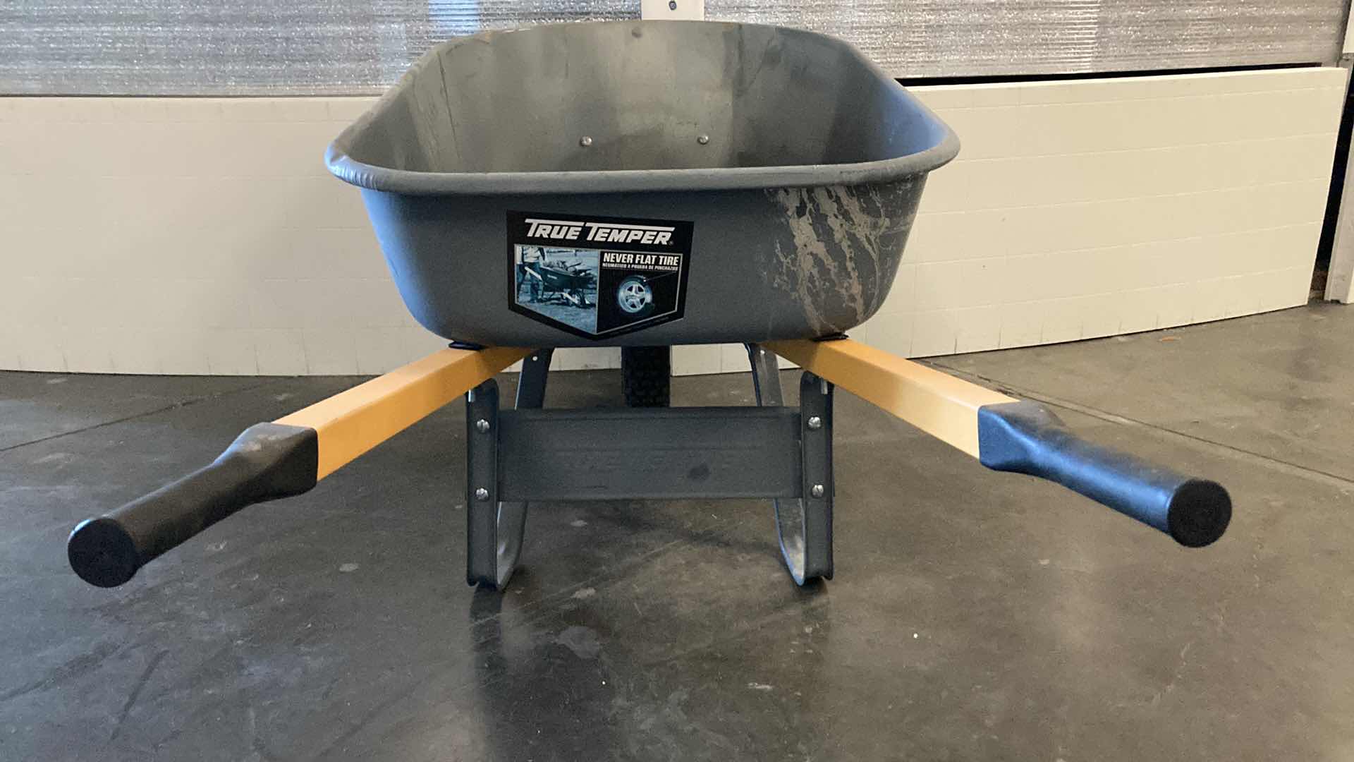 Photo 1 of TRUE TEMPER TIRE NEVER FLAT WHEEL BARREL 62” X 25” H27”