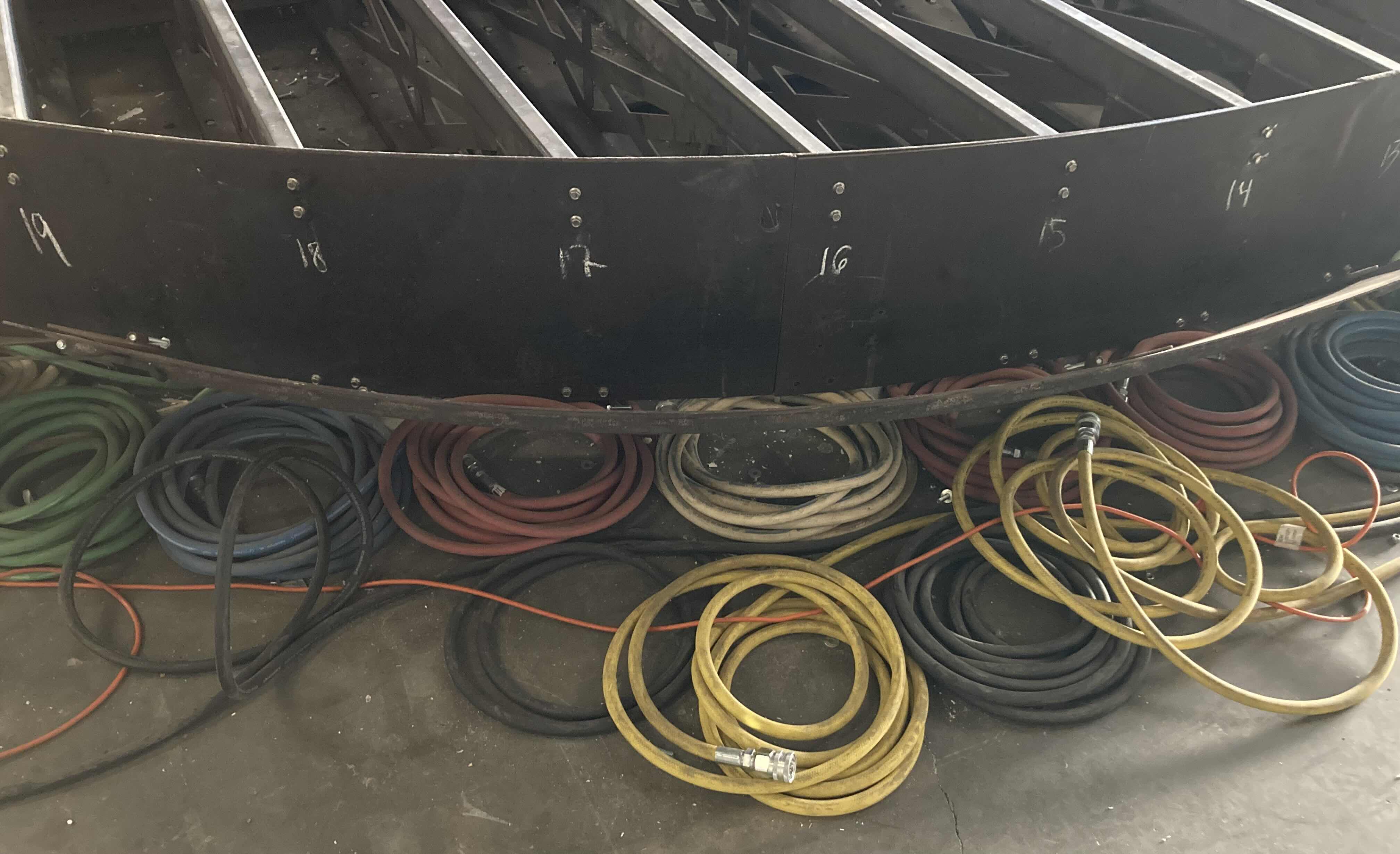 Photo 1 of CUSTOM FABRICATED HEAVY-DUTY STEEL AIR HOSE OPERATED VEHICLE PLATFORM W 19 AIR HOSES FOR BAG LIFT- VARIOUS LENGTHS & PSI CAPACITY 353” X 282” H23” (APPOX 2-3TONS)