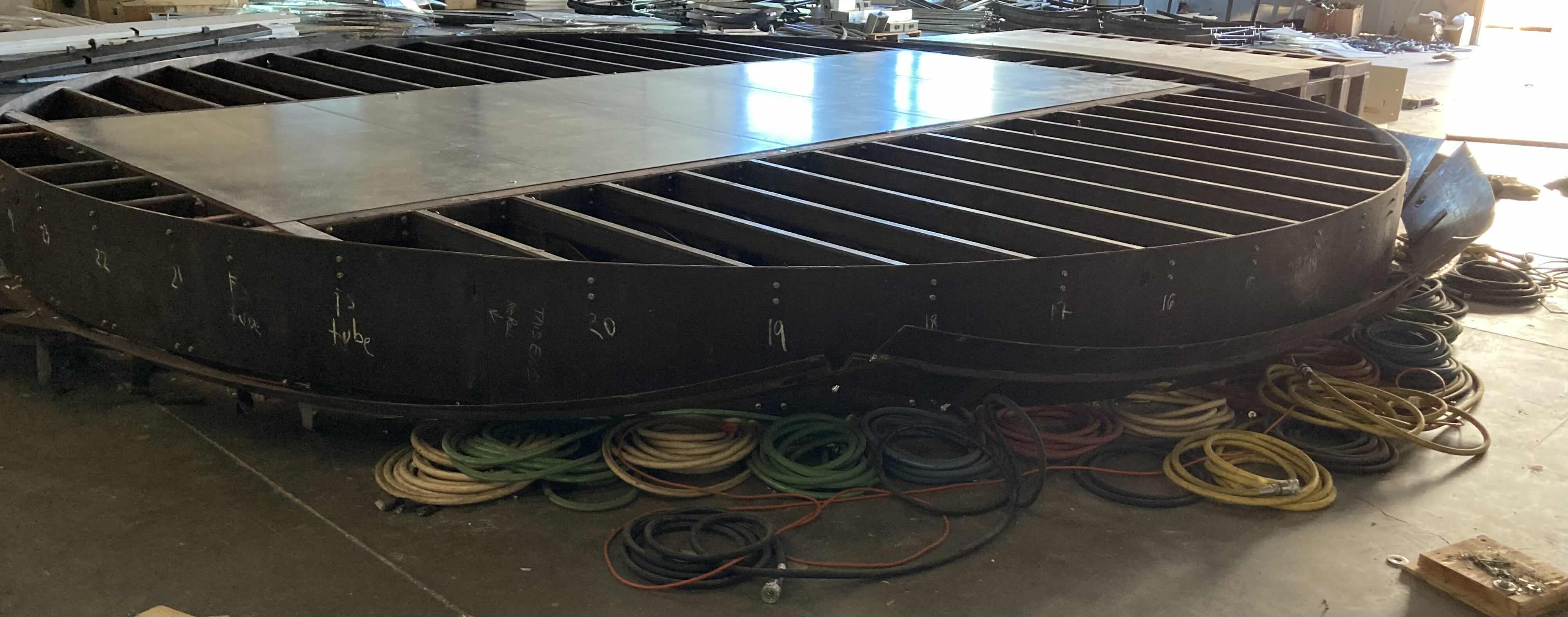 Photo 1 of CUSTOM FABRICATED HEAVY-DUTY STEEL AIR HOSE OPERATED VEHICLE PLATFORM W 19 AIR HOSES FOR BAG LIFT- VARIOUS LENGTHS & PSI CAPACITY 353” X 282” H23” (APPOX 2-3TONS)