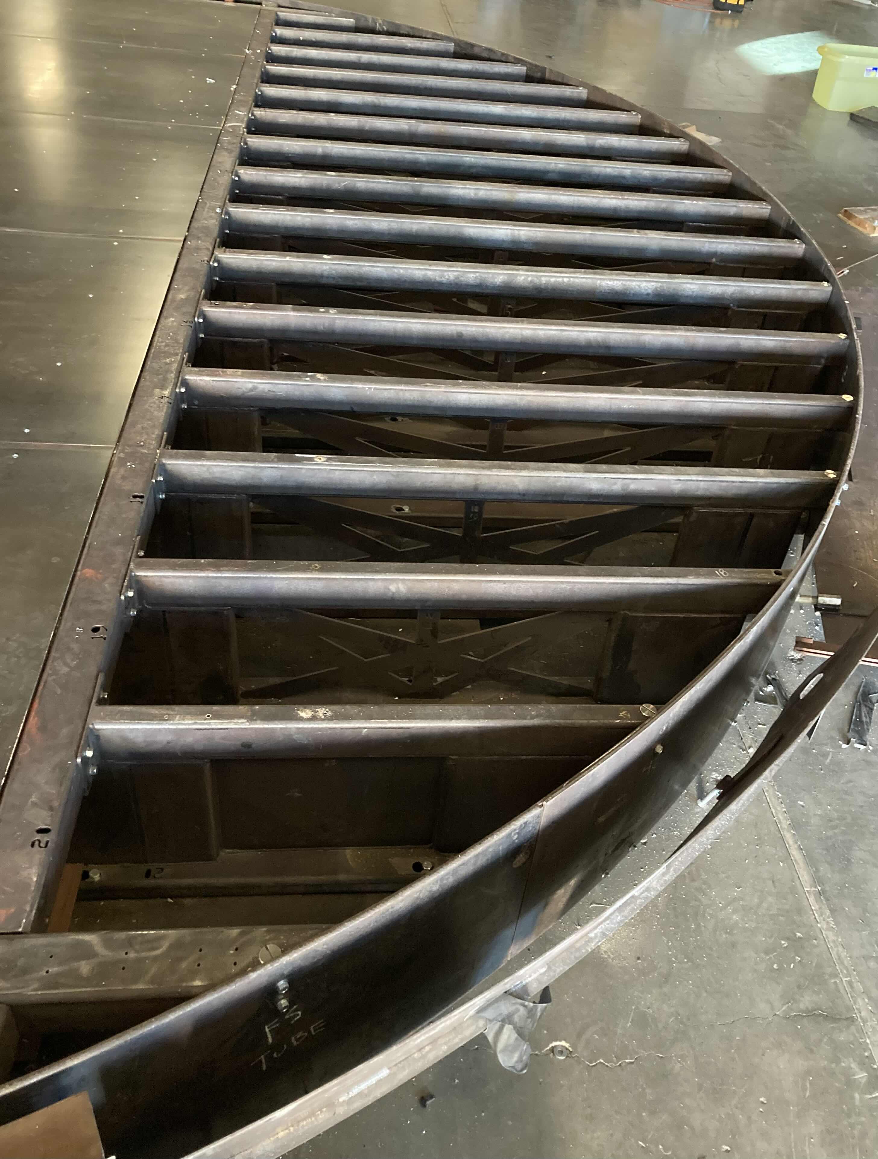 Photo 1 of CUSTOM FABRICATED HEAVY-DUTY STEEL AIR HOSE OPERATED VEHICLE PLATFORM W 19 AIR HOSES FOR BAG LIFT- VARIOUS LENGTHS & PSI CAPACITY 353” X 282” H23” (APPOX 2-3TONS)