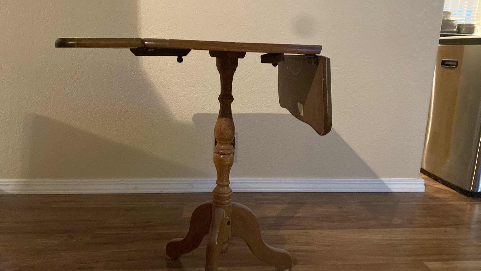 Photo 1 of ANTIQUE WOOD TABLE WITH DROP DOWN SIDES 