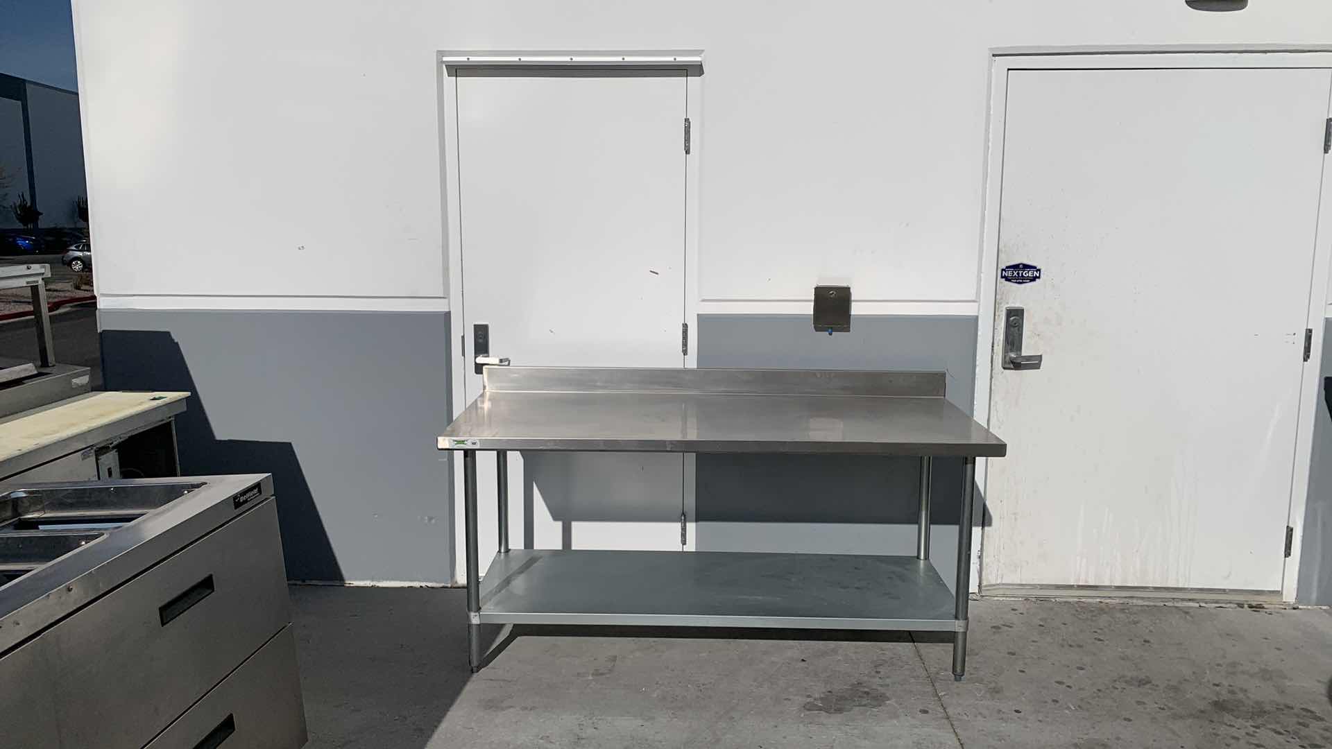 Photo 1 of REGENCY STAINLESS STEEL PREP TABLE 72” x 30.5” H 34”