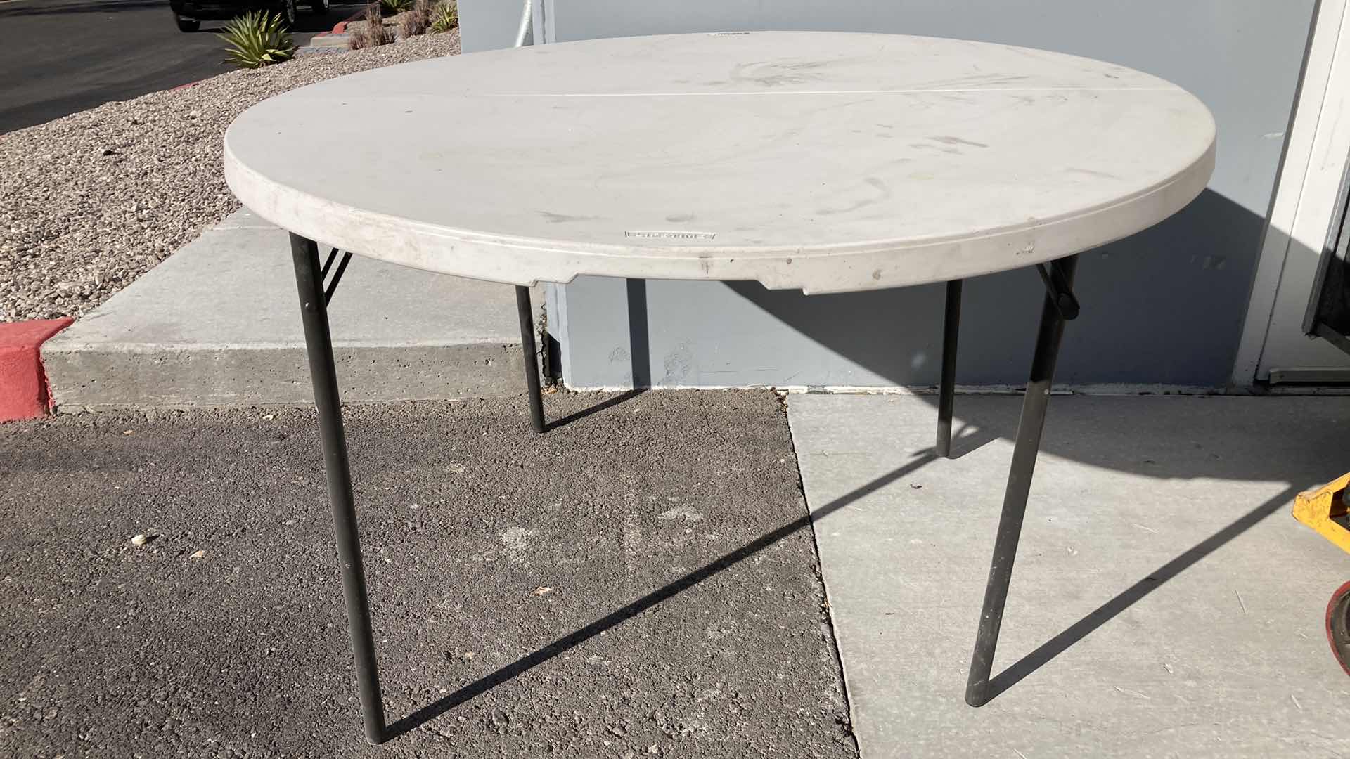 Photo 1 of LIFETIME ROUND FOLDING TABLE 47.5” X 29”