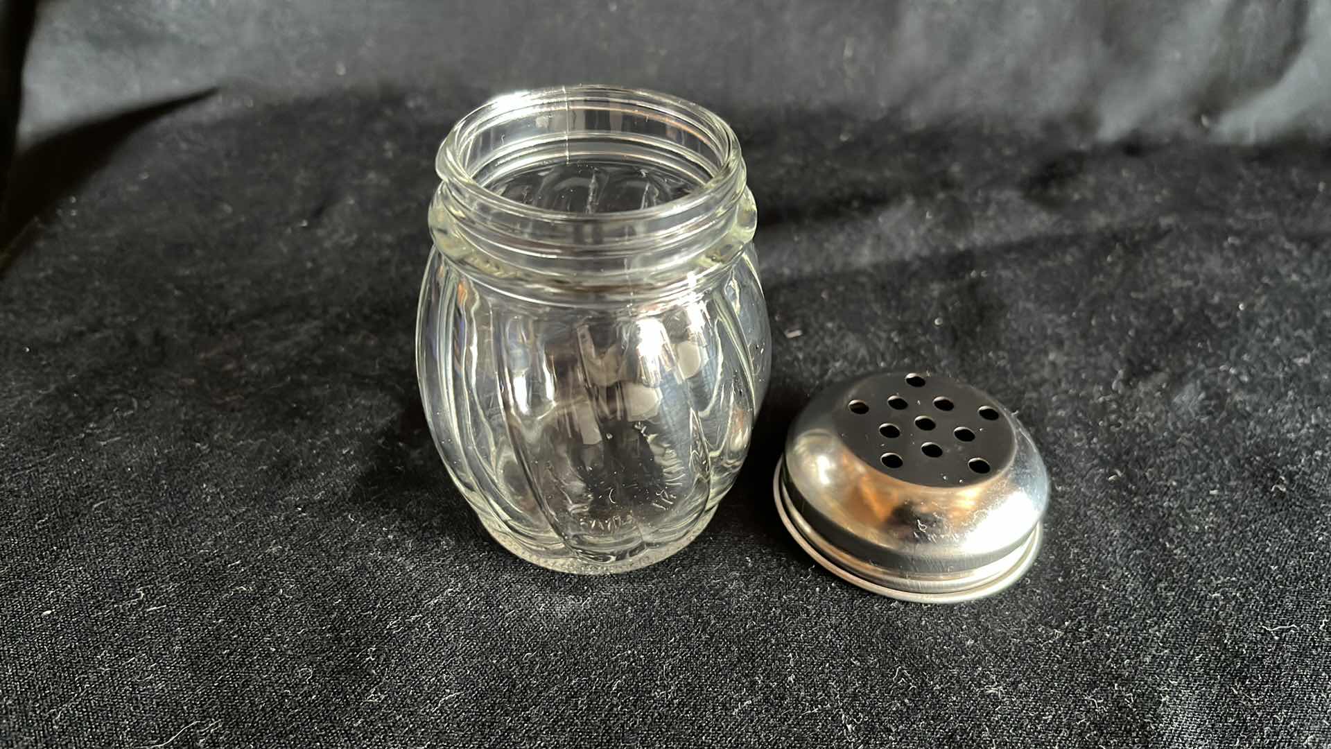 Photo 1 of GLASS CHEESE SHAKER W PERFORATED CHROME-PLATED LID (12)