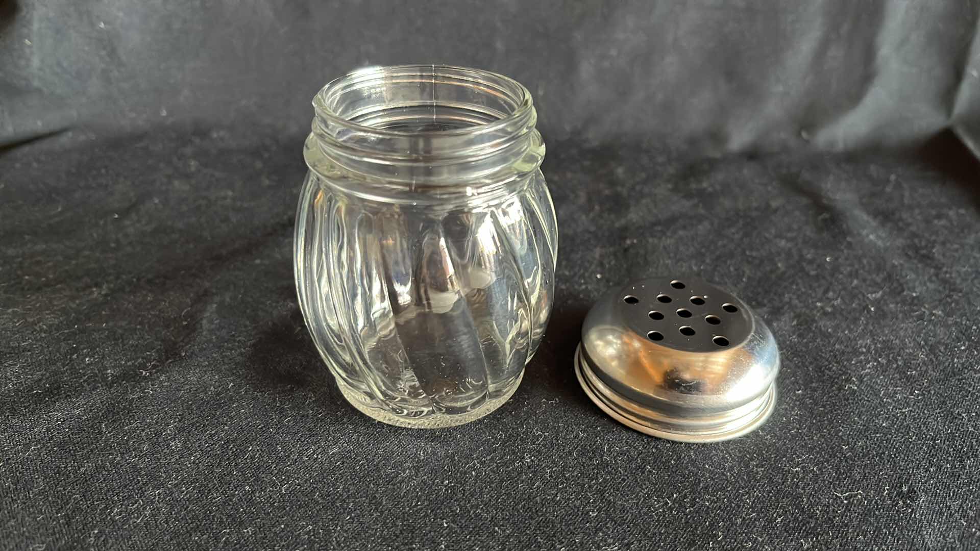 Photo 1 of GLASS CHEESE SHAKER W PERFORATED CHROME-PLATED LID (12)