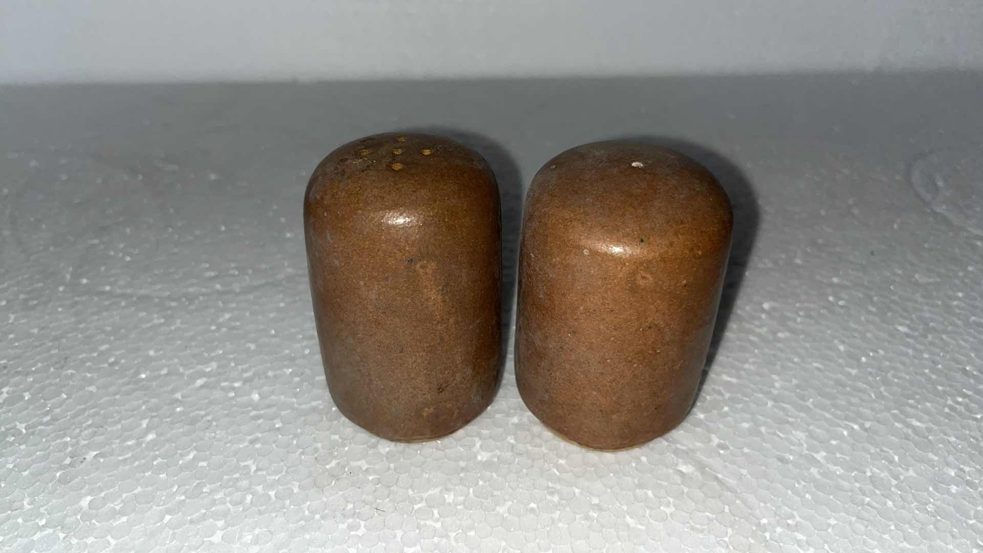 Photo 1 of MEXICAN CLAY PLATE SET W SALT & PEPPER SHAKES AND CONDIMENT HOLDER (19)