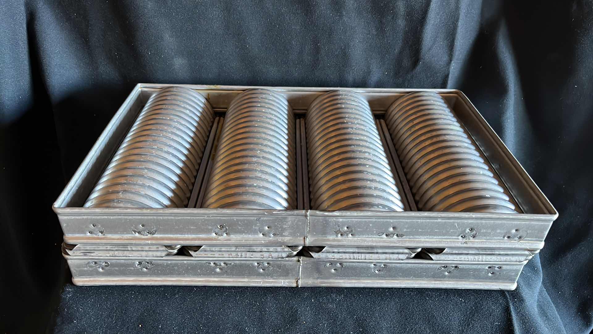 Photo 1 of CHICAGO METALLIC CRIMPED BREAD PAN SET, ROUND 10.25” X 17” (1)