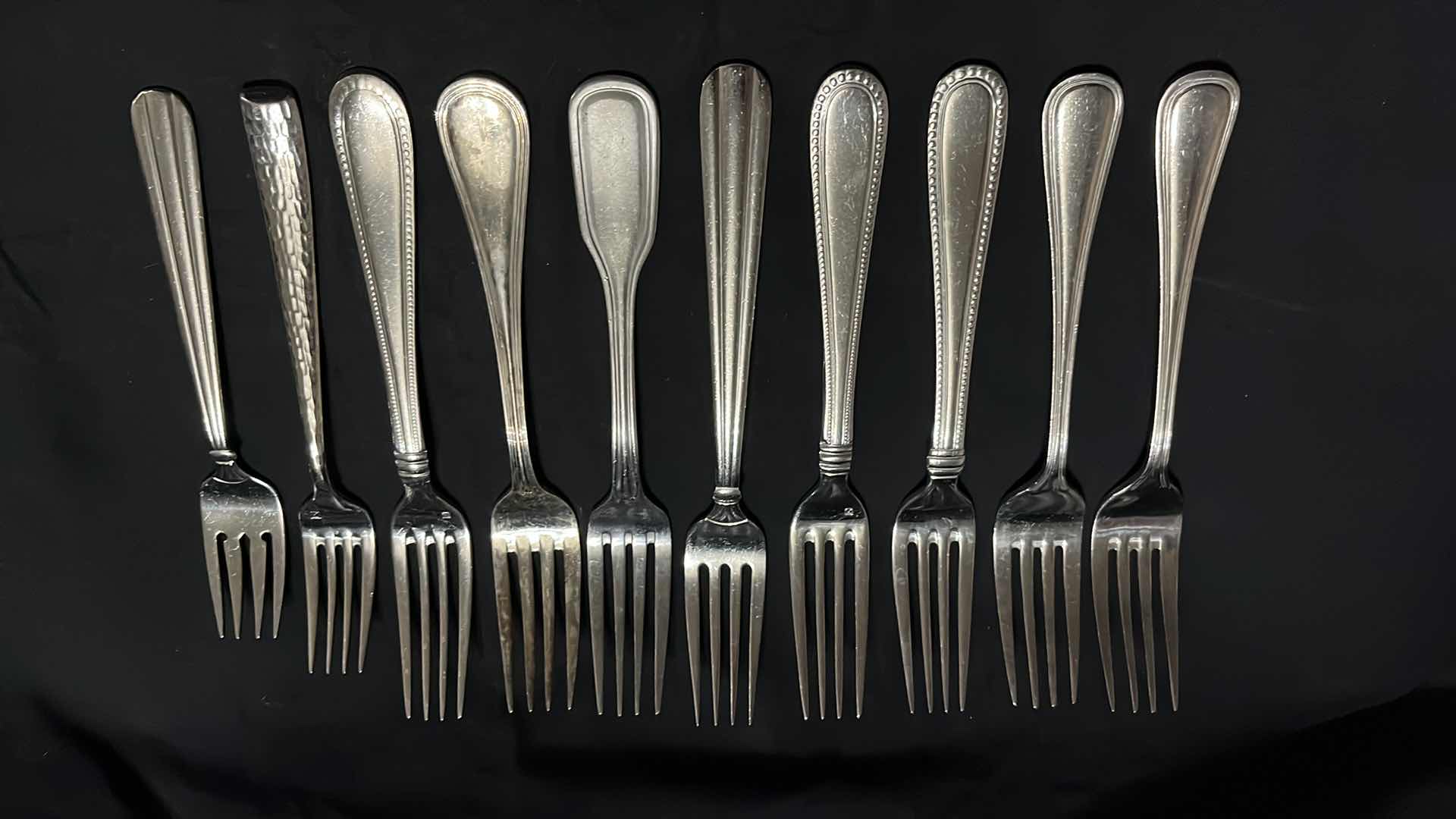 Photo 3 of STAINLESS STEEL FLATWARE, VARIOUS STYLES IN EACH UTENSIL, 10 OF EACH, 4.25” - 9.25” (40 PCS)