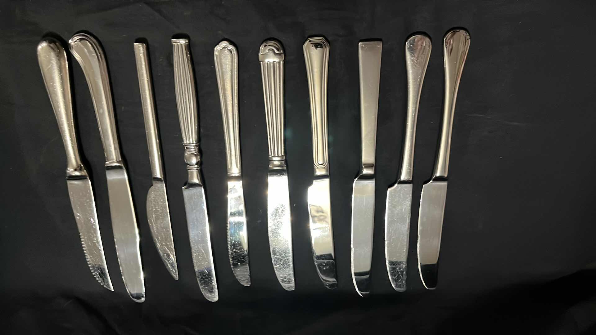 Photo 2 of STAINLESS STEEL FLATWARE, VARIOUS STYLES IN EACH UTENSIL, 10 OF EACH, 4.25” - 9.25” (40 PCS)