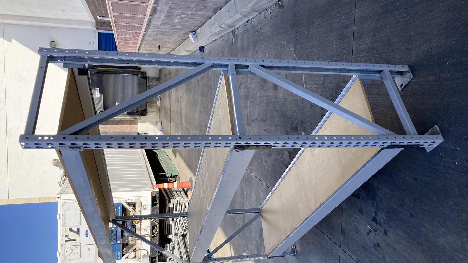 Photo 1 of MADIX HEAVY DUTY STEEL RACK W PARTICLE BOARD SHELVES 102” X 23” H 85”