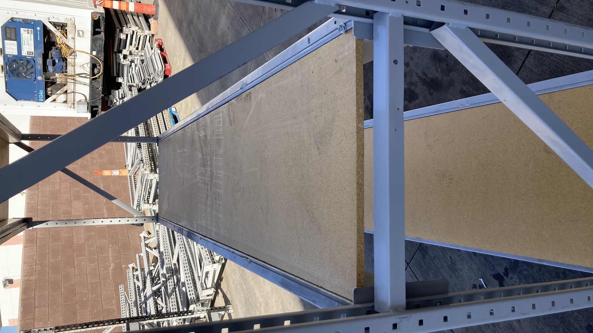 Photo 1 of MADIX HEAVY DUTY STEEL RACK W PARTICLE BOARD SHELVES 102” X 23” H 85”