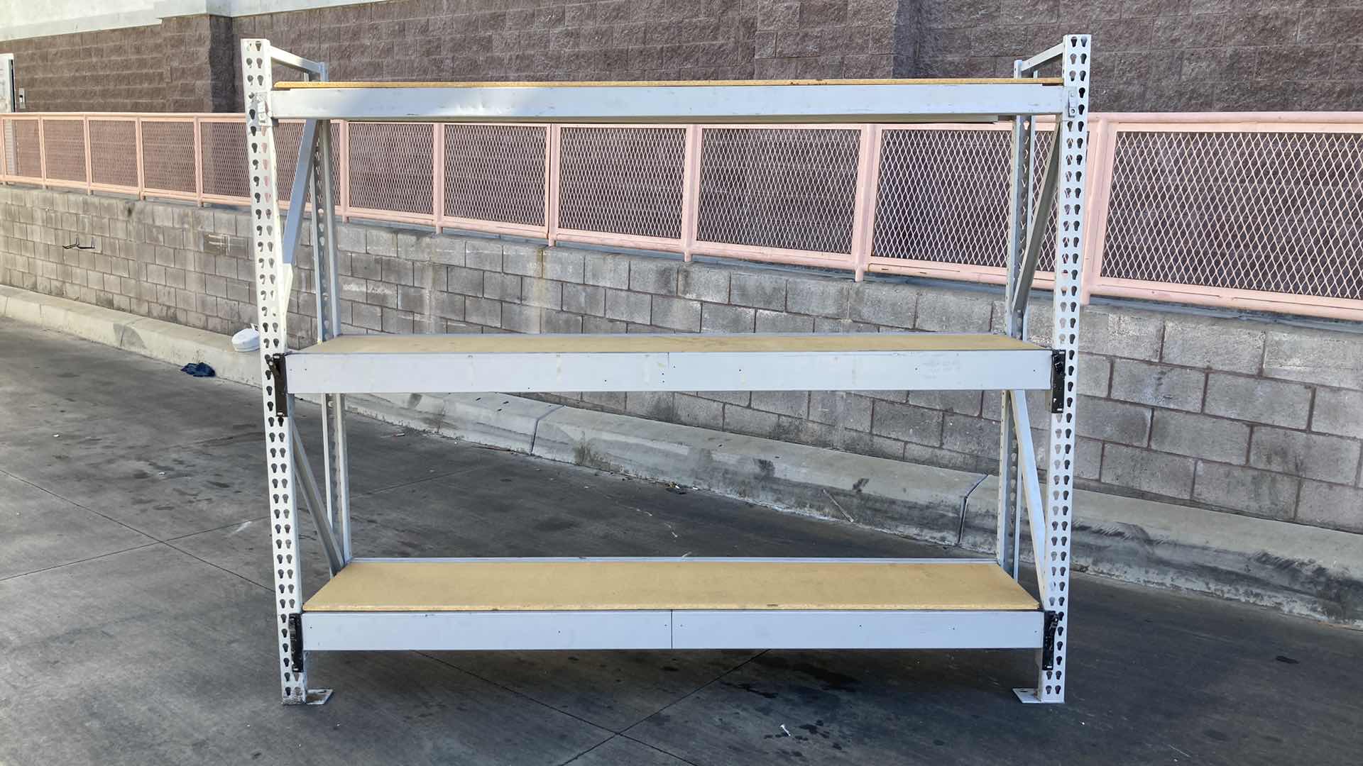 Photo 1 of MADIX HEAVY DUTY STEEL RACK W PARTICLE BOARD SHELVES 102” X 23” H 85”