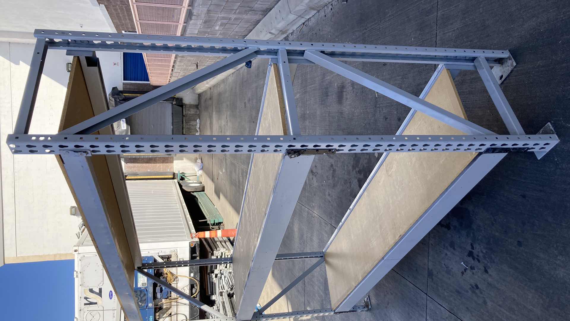 Photo 1 of MADIX HEAVY DUTY STEEL RACK W PARTICLE BOARD SHELVES 102” X 23” H 85”