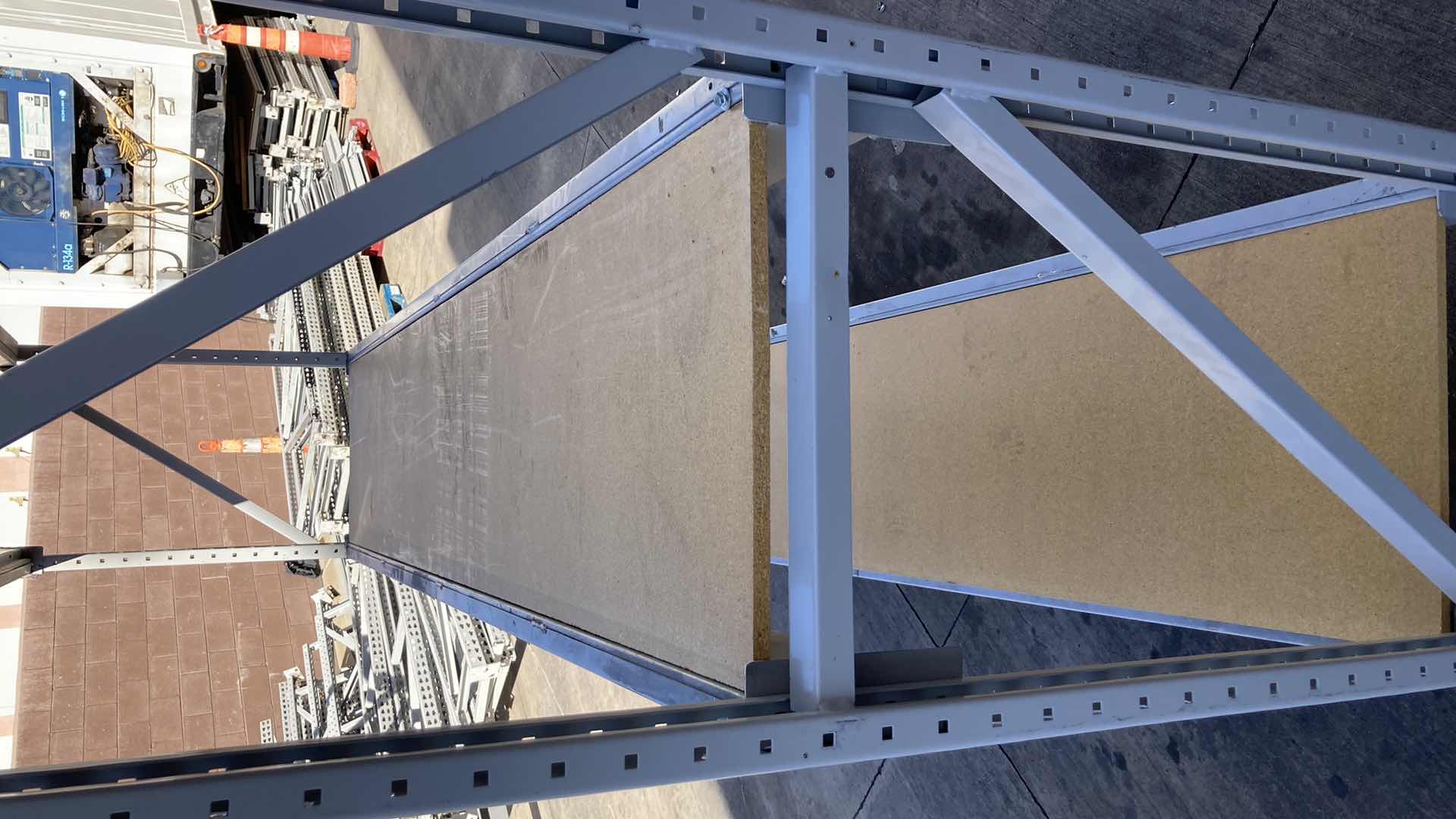 Photo 1 of MADIX HEAVY DUTY STEEL RACK W PARTICLE BOARD SHELVES 102” X 23” H 85”