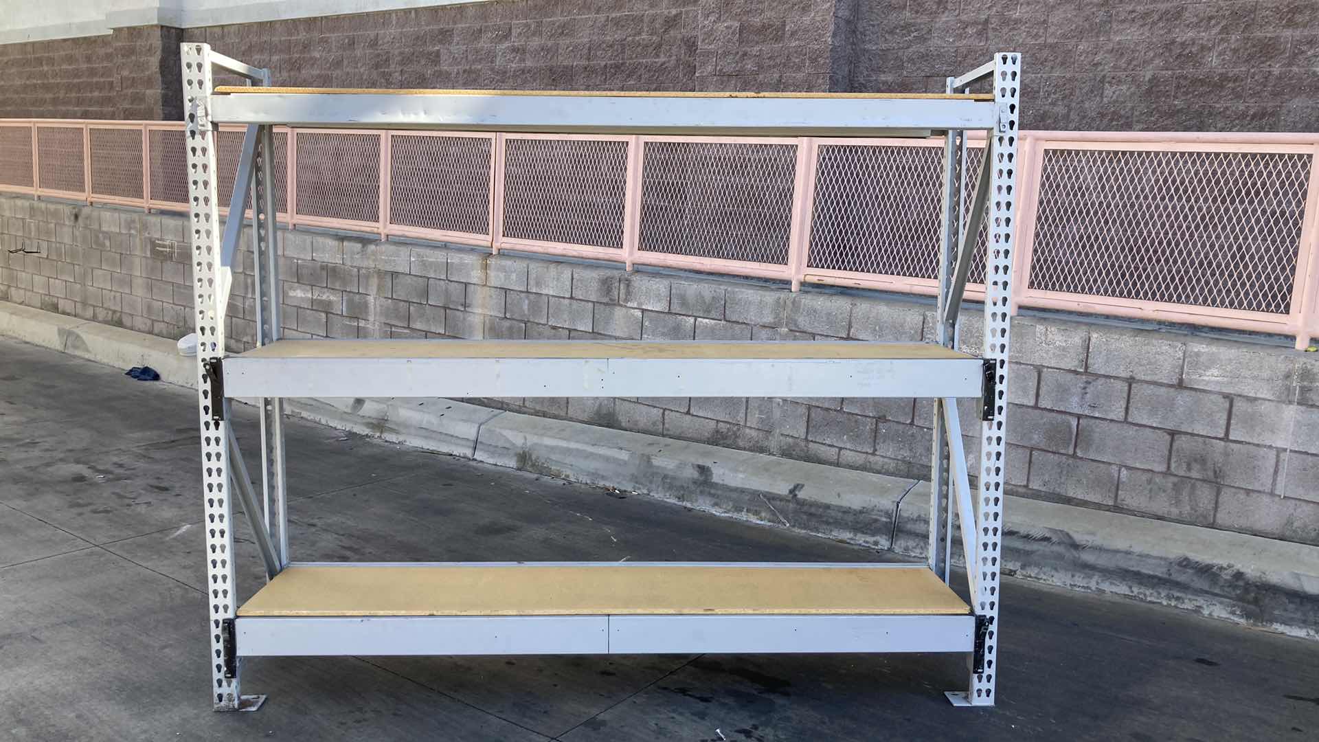 Photo 1 of MADIX HEAVY DUTY STEEL RACK W PARTICLE BOARD SHELVES 102” X 23” H 85”