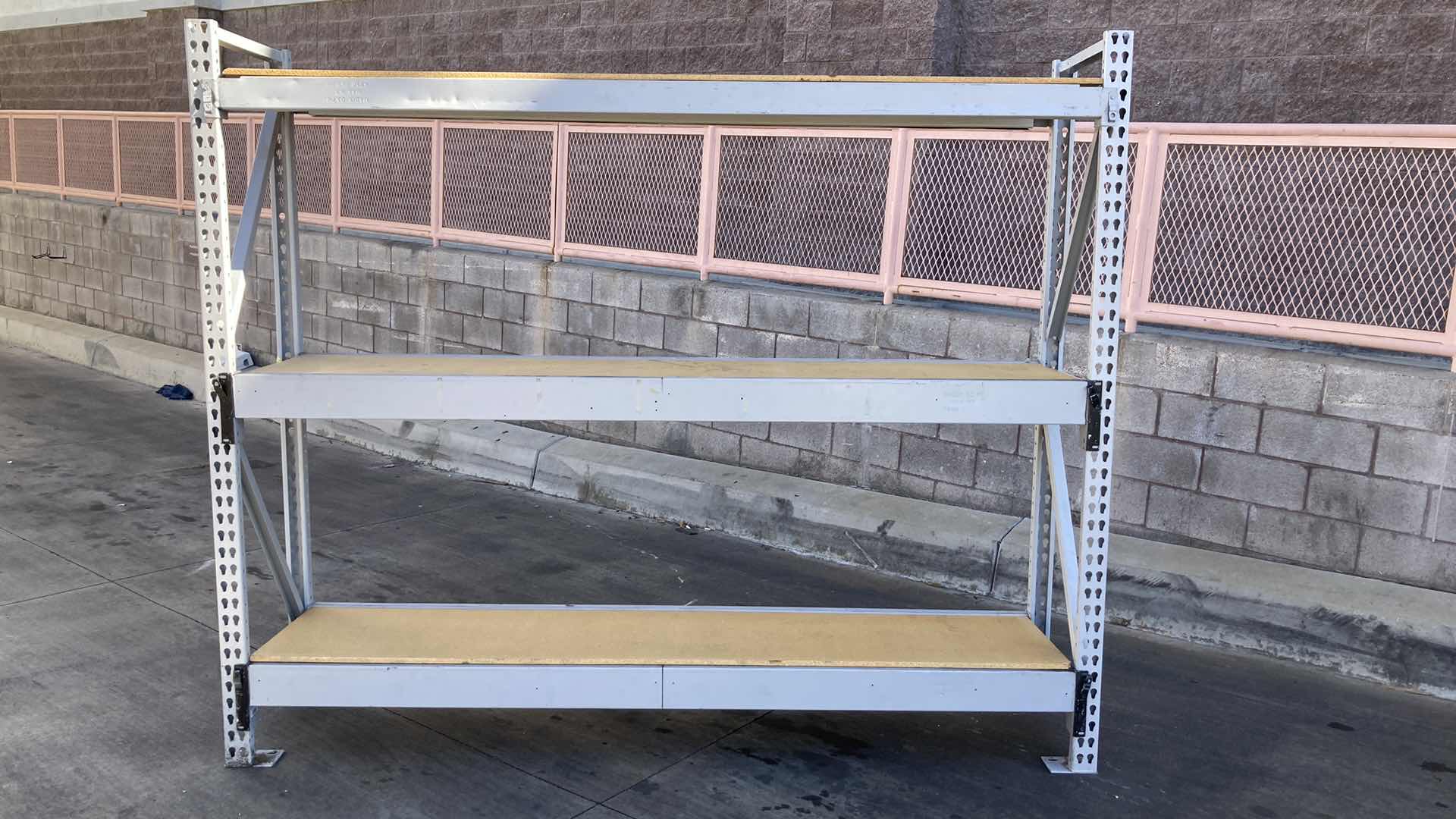 Photo 1 of MADIX HEAVY DUTY STEEL RACK W PARTICLE BOARD SHELVES 102” X 23” H 85”