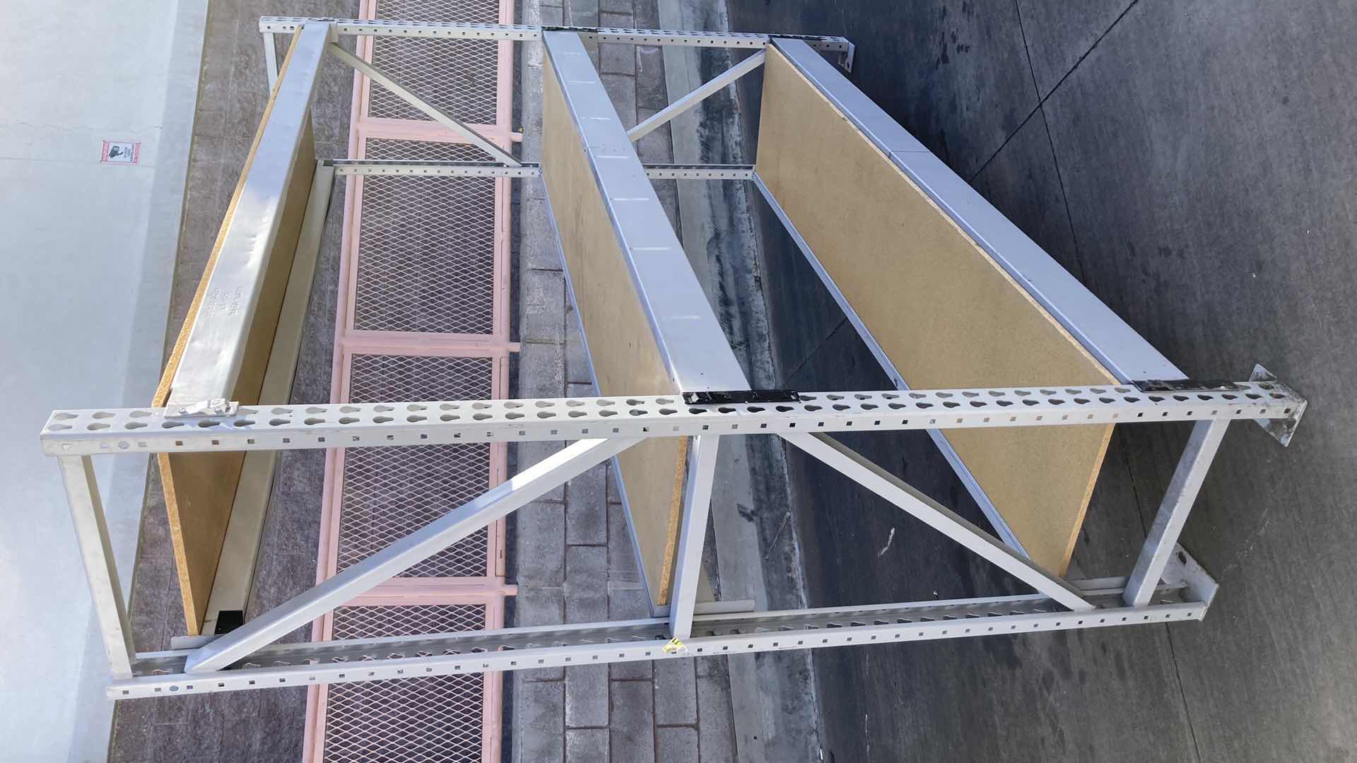 Photo 1 of MADIX HEAVY DUTY STEEL RACK W PARTICLE BOARD SHELVES 102” X 23” H 85”