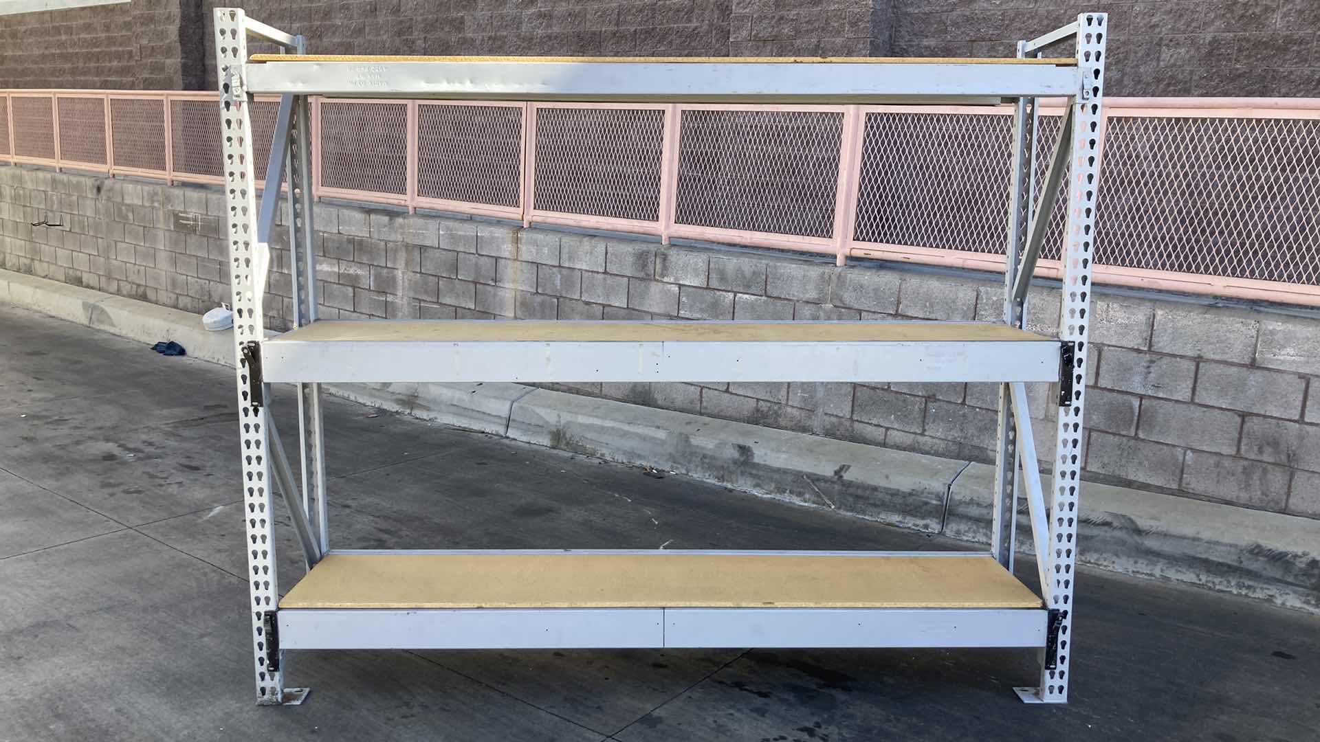 Photo 1 of MADIX HEAVY DUTY STEEL RACK W PARTICLE BOARD SHELVES 102” X 23” H 85”