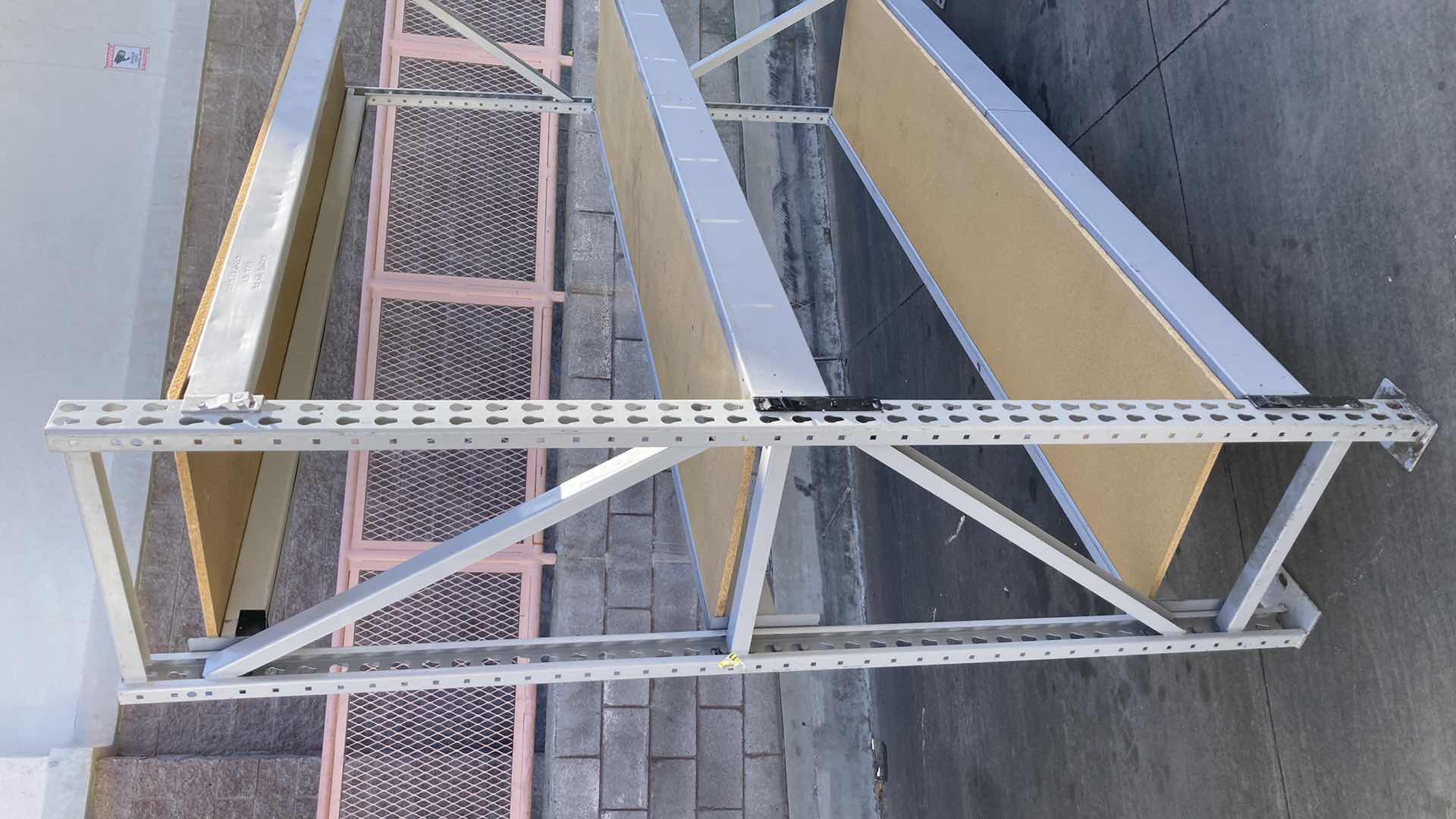 Photo 1 of MADIX HEAVY DUTY STEEL RACK W PARTICLE BOARD SHELVES 102” X 23” H 85”