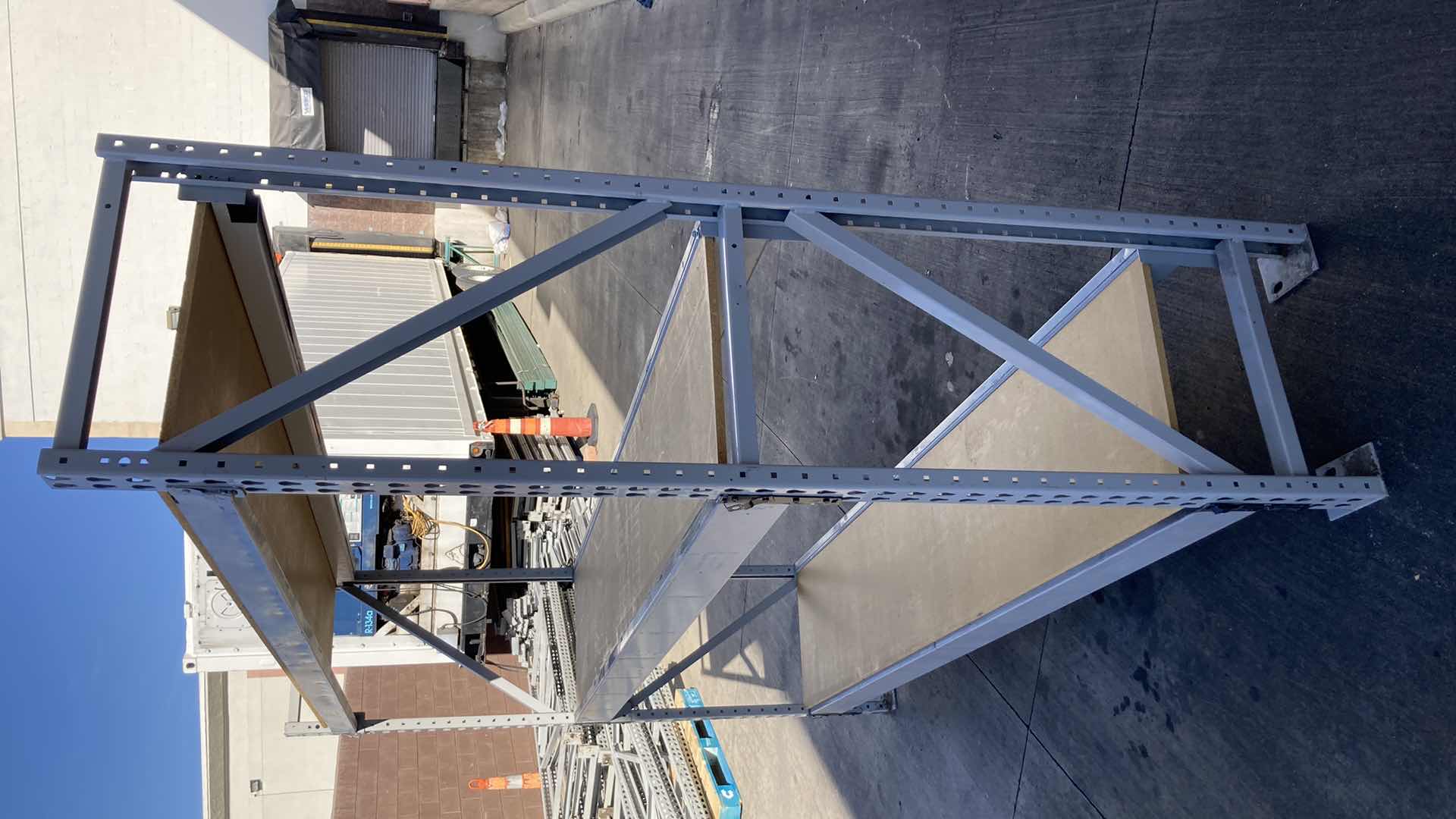 Photo 1 of MADIX HEAVY DUTY STEEL RACK W PARTICLE BOARD SHELVES 102” X 23” H 85”