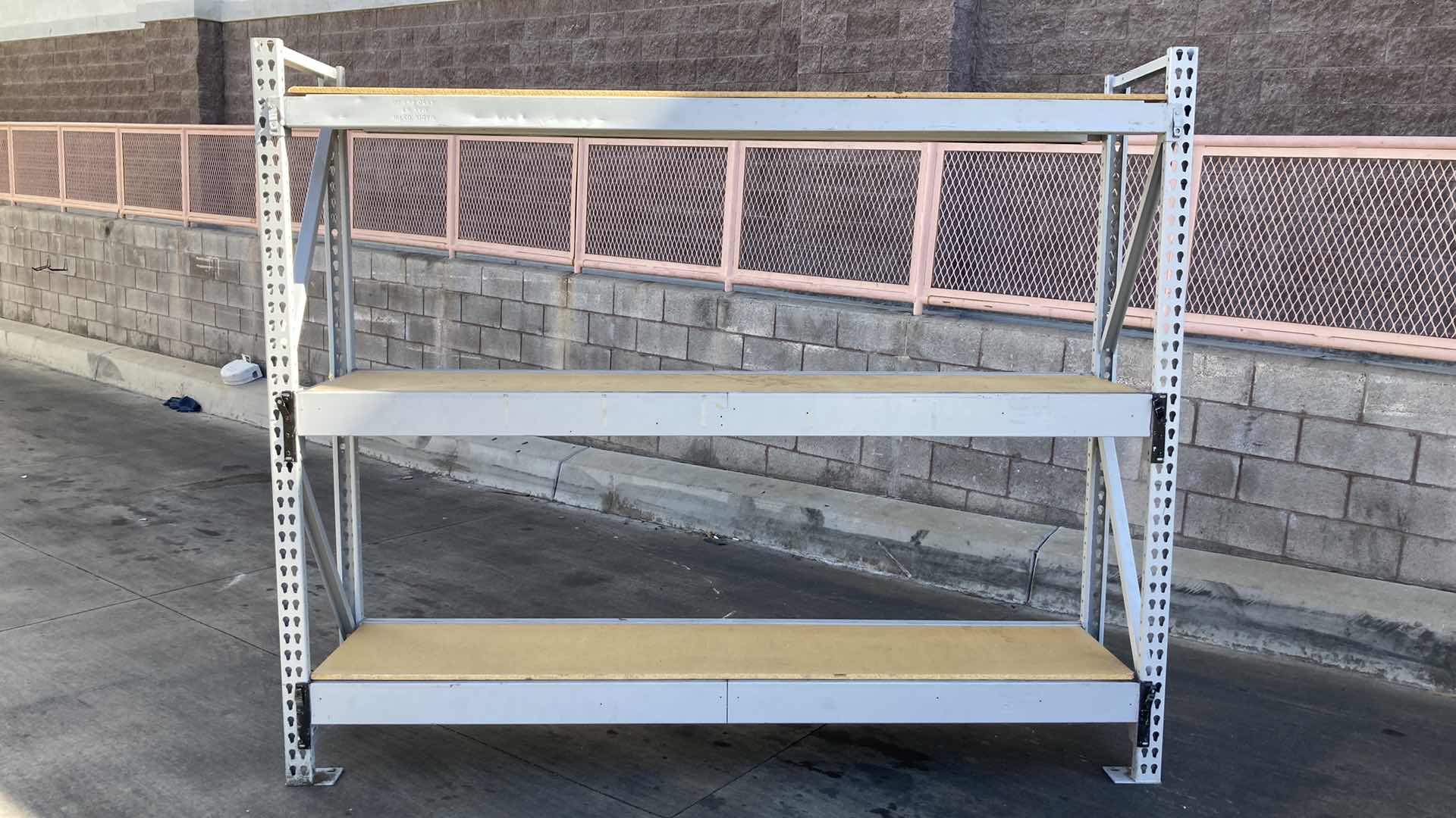 Photo 1 of MADIX HEAVY DUTY STEEL RACK W PARTICLE BOARD SHELVES 102” X 23” H 85”