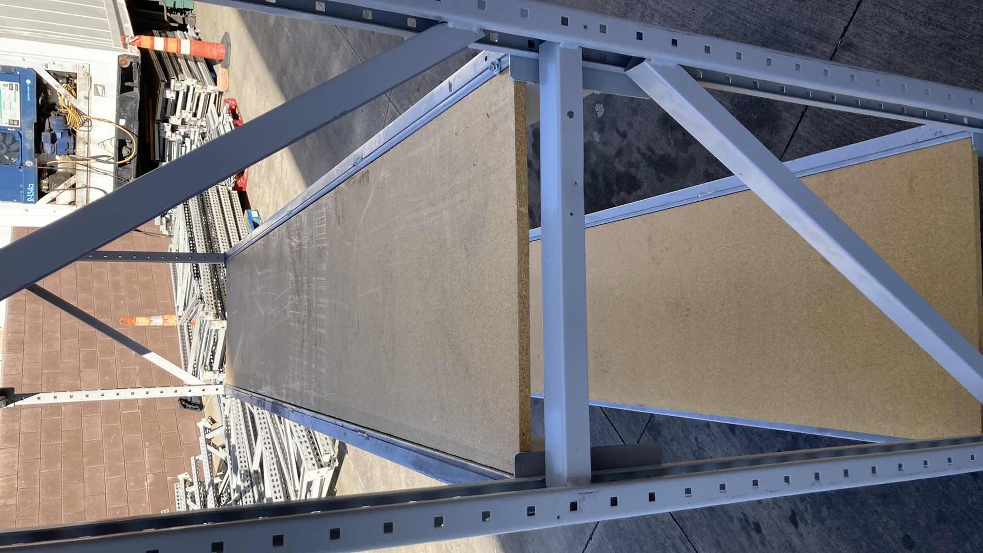 Photo 4 of MADIX HEAVY DUTY STEEL RACK W PARTICLE BOARD SHELVES 102” X 23” H 85”