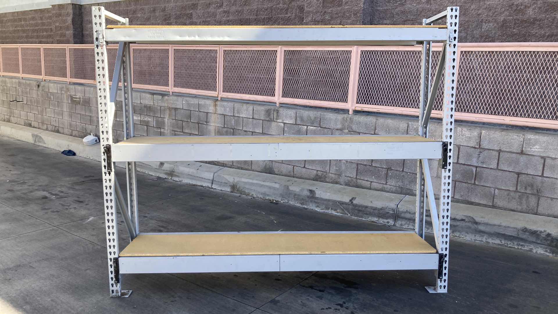 Photo 1 of MADIX HEAVY DUTY STEEL RACK W PARTICLE BOARD SHELVES 102” X 23” H 85”