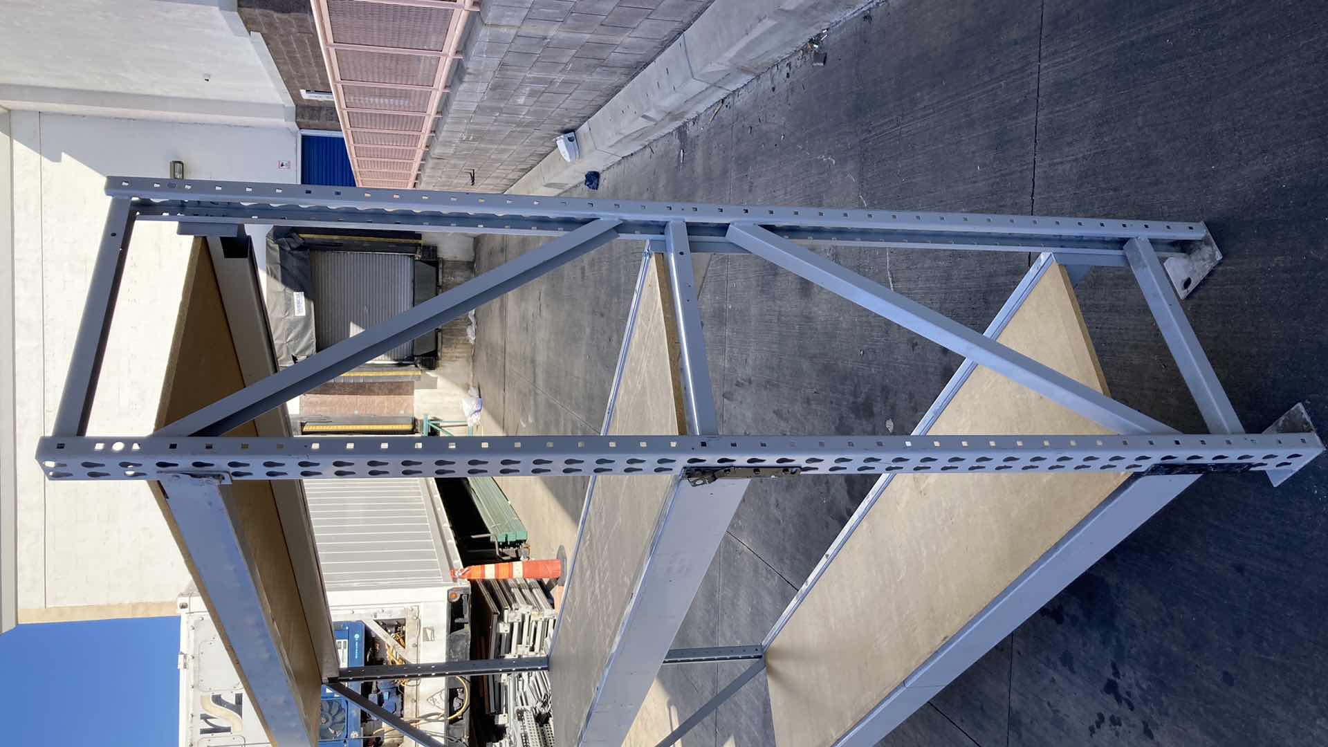 Photo 1 of MADIX HEAVY DUTY STEEL RACK W PARTICLE BOARD SHELVES 102” X 23” H 85”